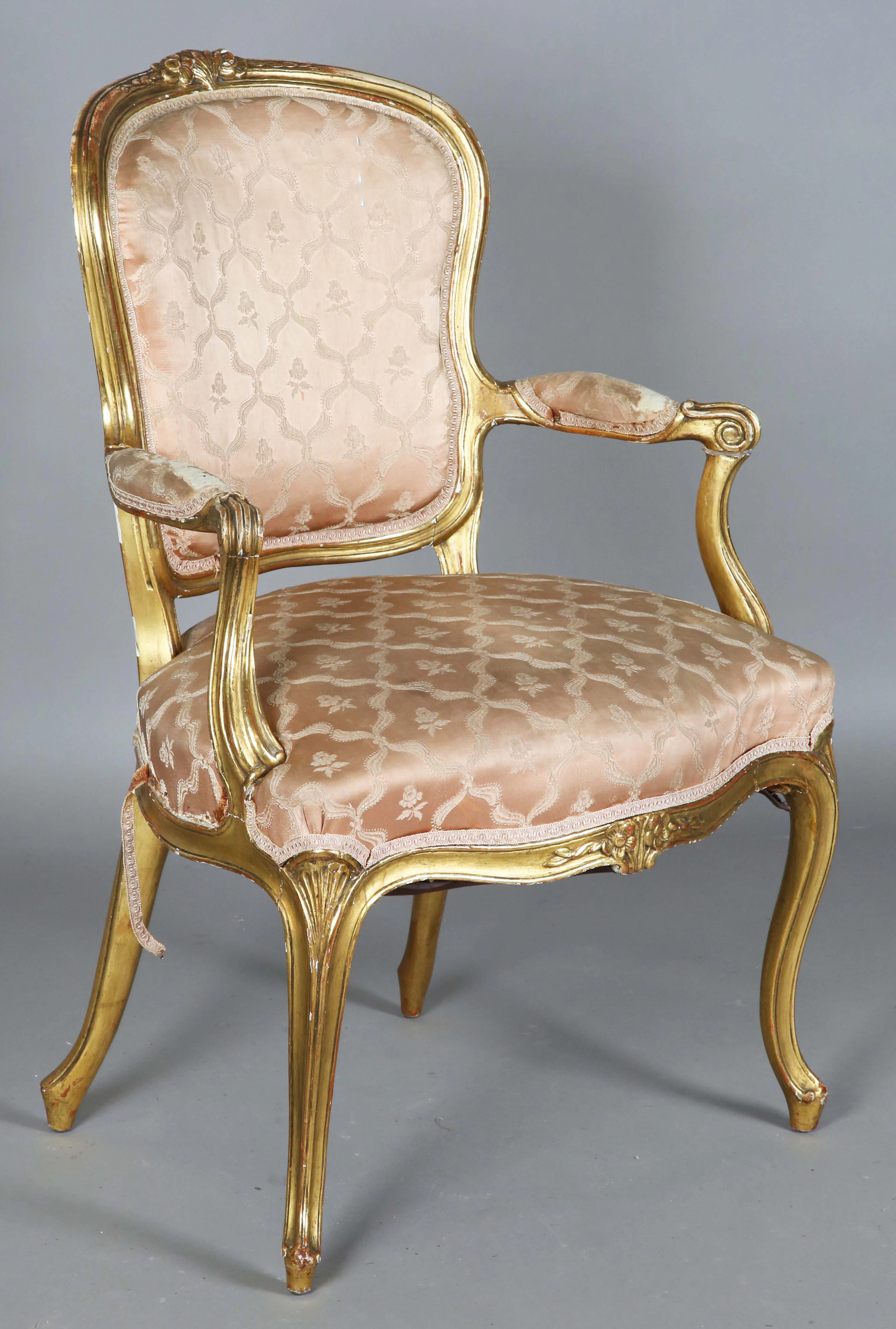 A late 19th/early 20th century French gilt showframe fauteuil armchair