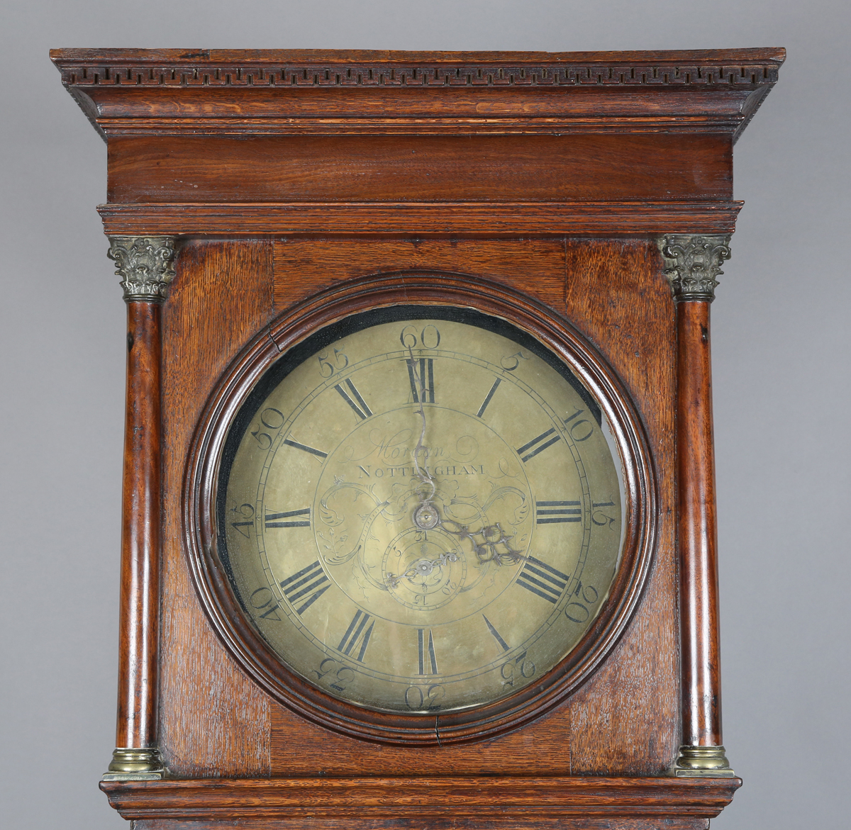 A George III oak longcase clock with thirty hour movement striking ...