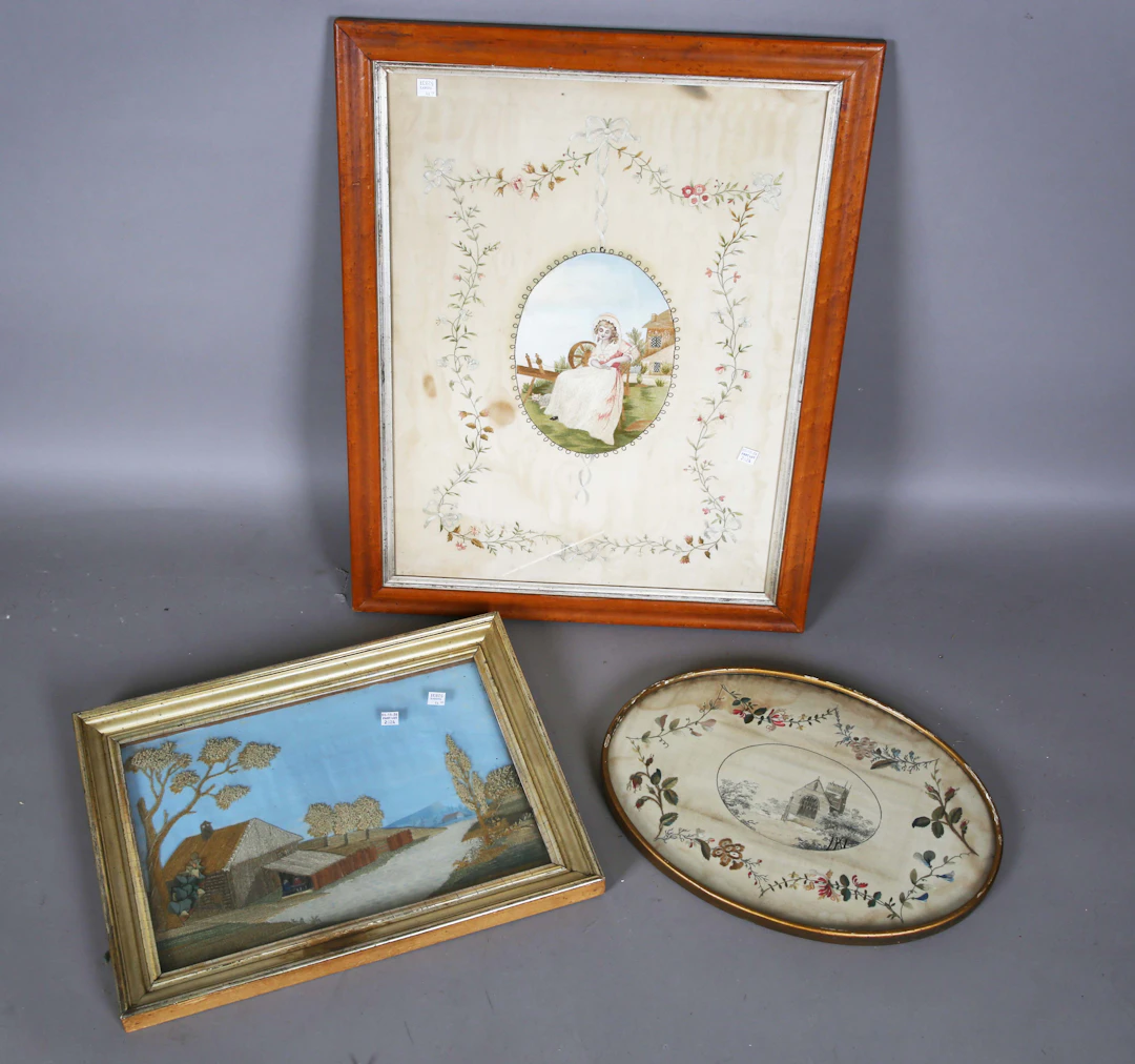 A large late 19th century silkwork panel, worked with a central oval