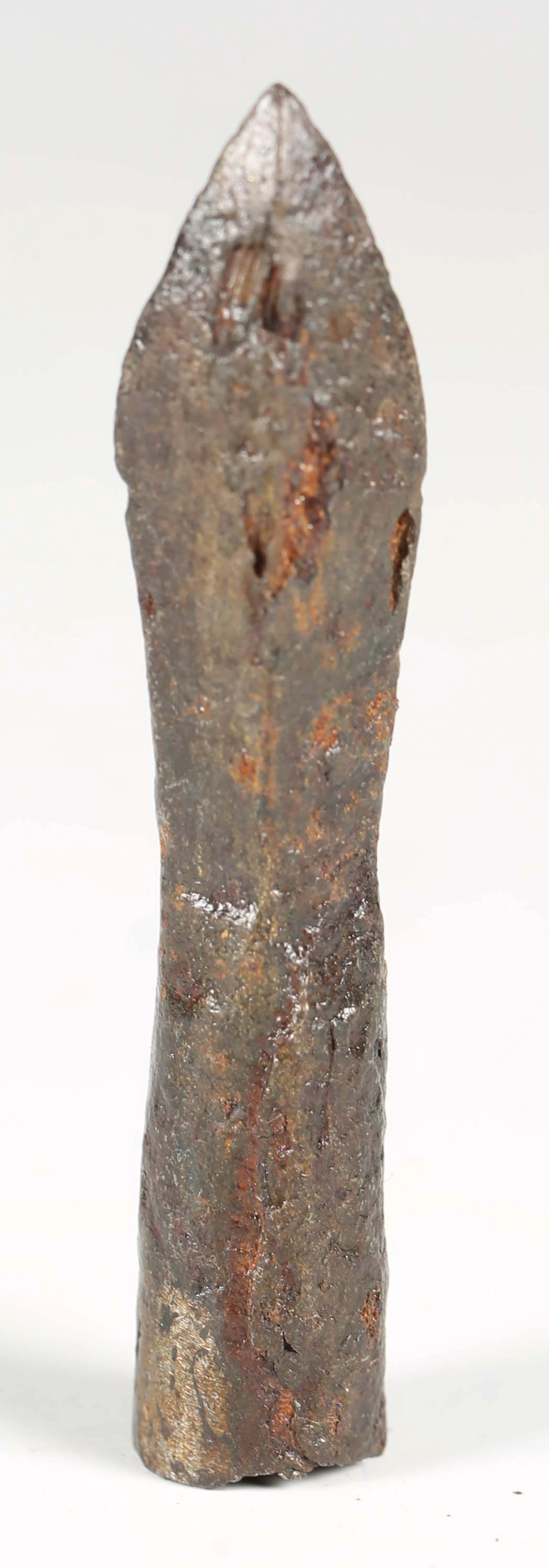 A medieval iron crossbow bolt head of diamond cross-section, length 7cm.