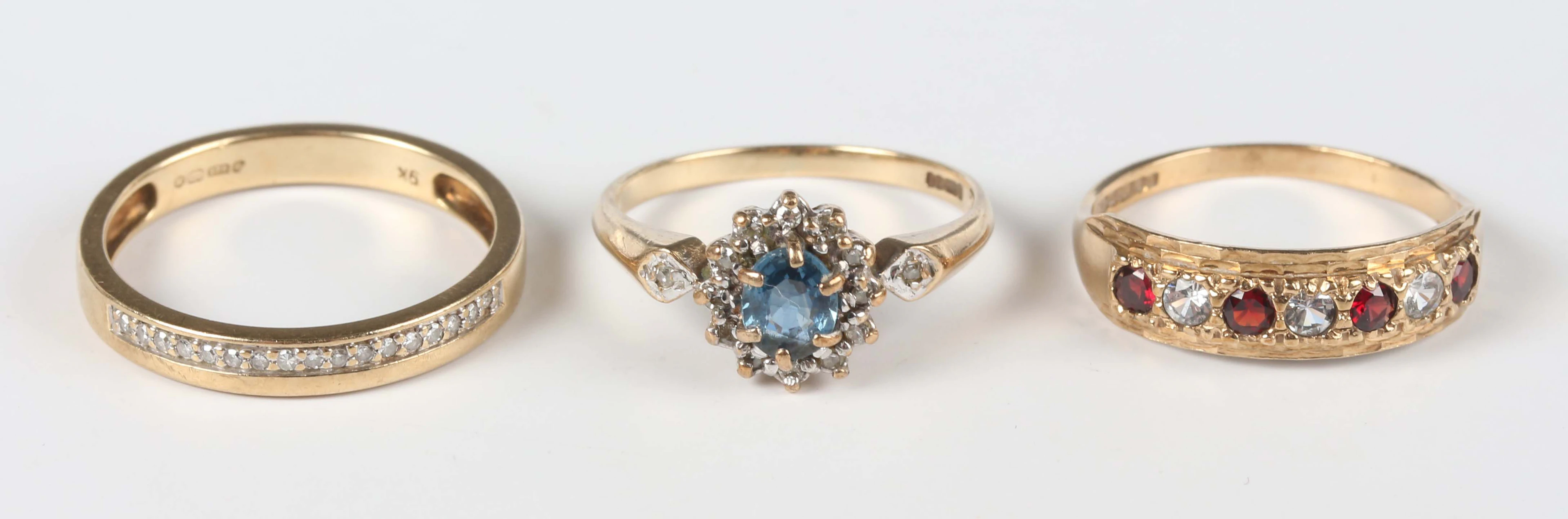 A 9ct gold, sapphire and diamond oval cluster ring, ring size approx