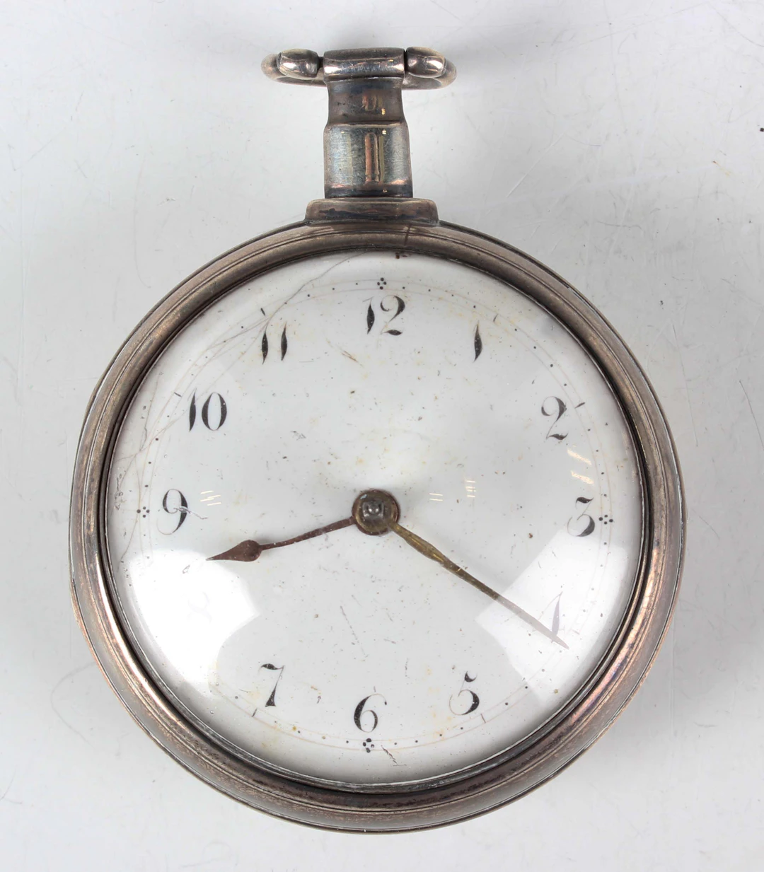 An early 19th century matched silver pair cased gentleman's pocket