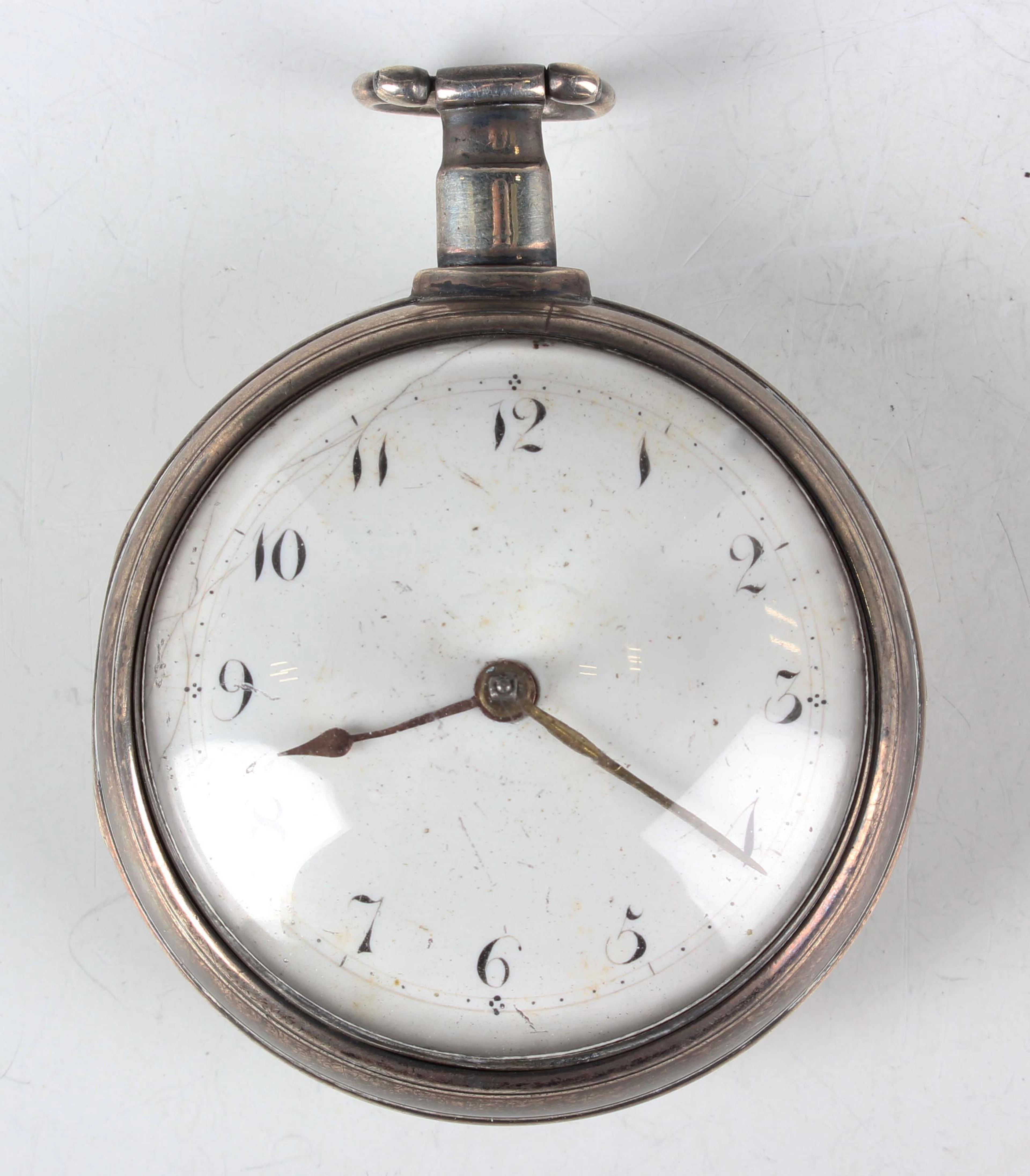 An early 19th century matched silver pair cased gentleman's pocket