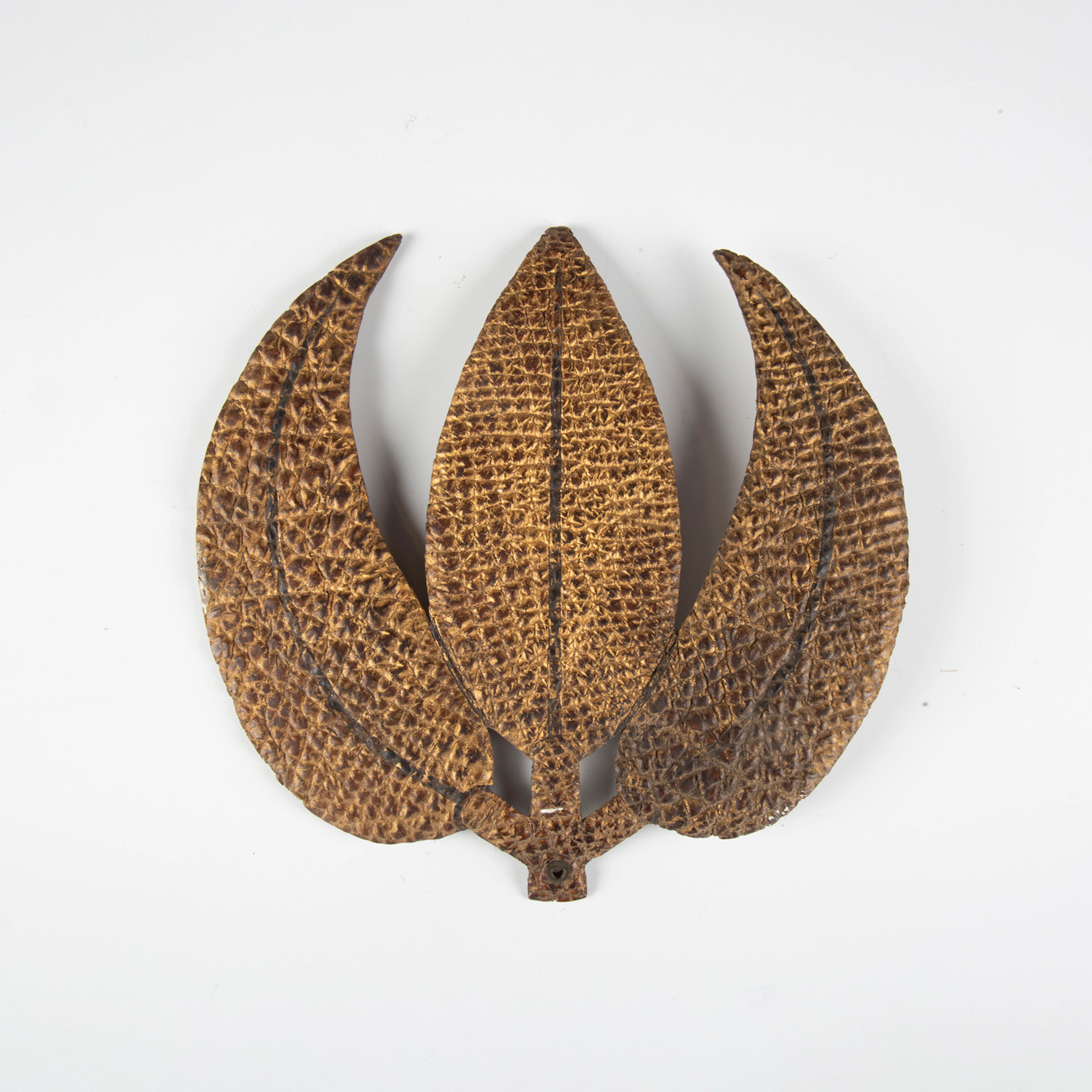 A rare Japanese embossed leather and lacquer-finished sashimono or