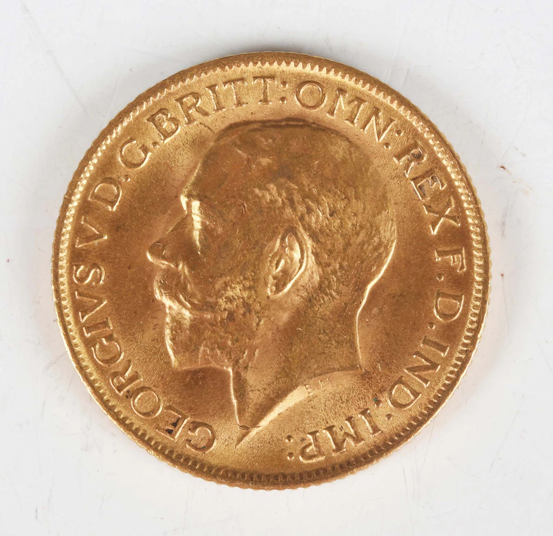 A George V sovereign 1915. Note: this lot includes an HMRC classified