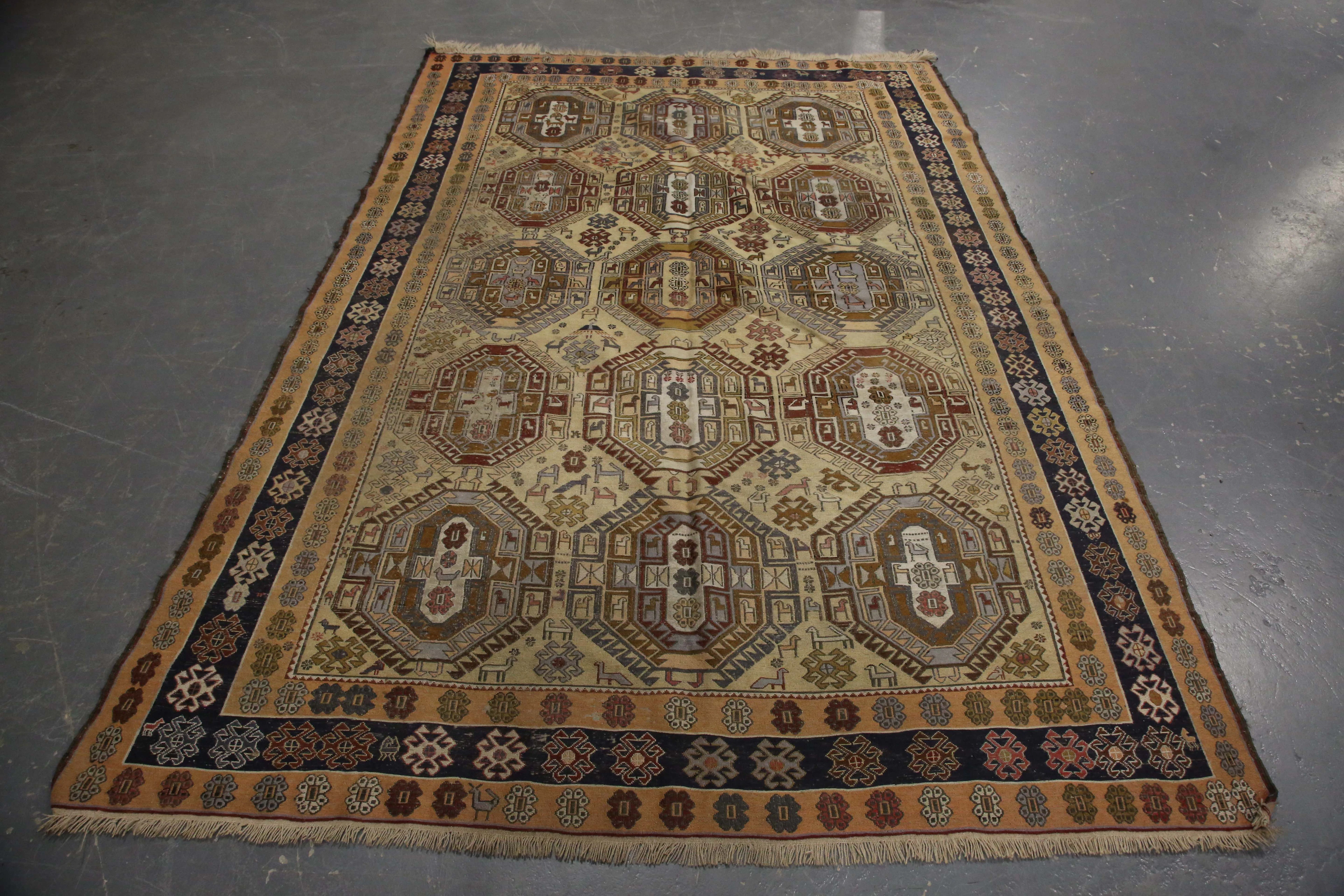 An Azari soumak flatweave carpet, mid-20th century, the ivory field
