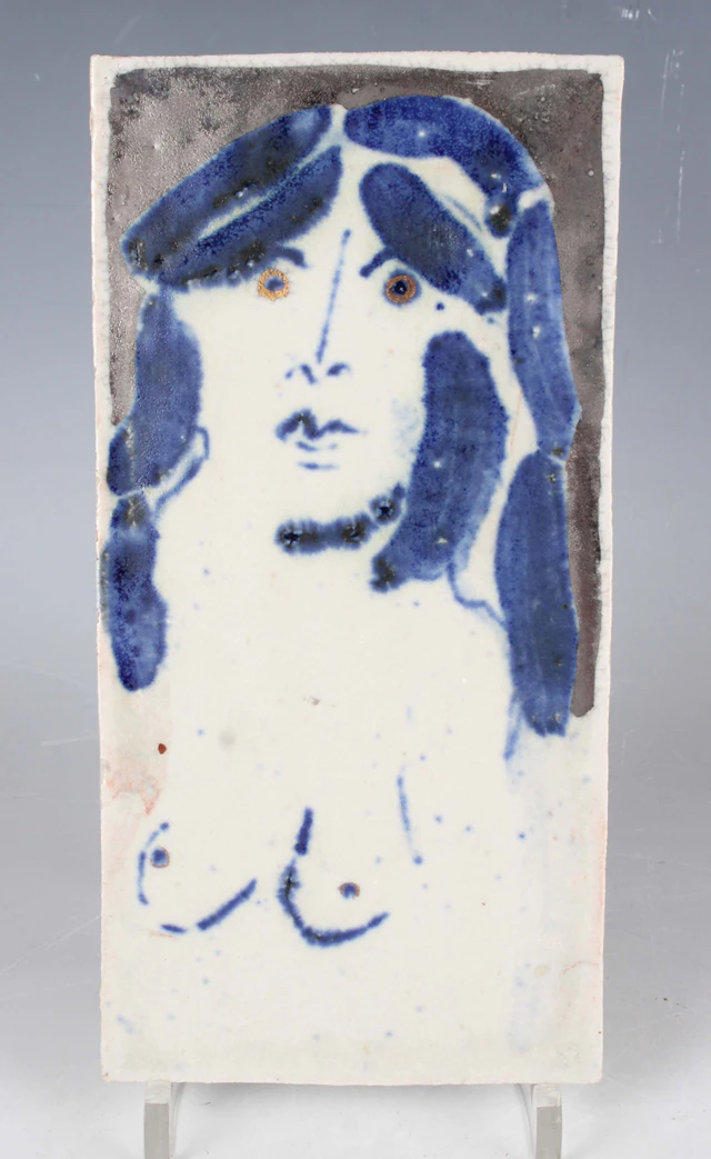 An Eric James Mellon studio pottery rectangular tile, painted with