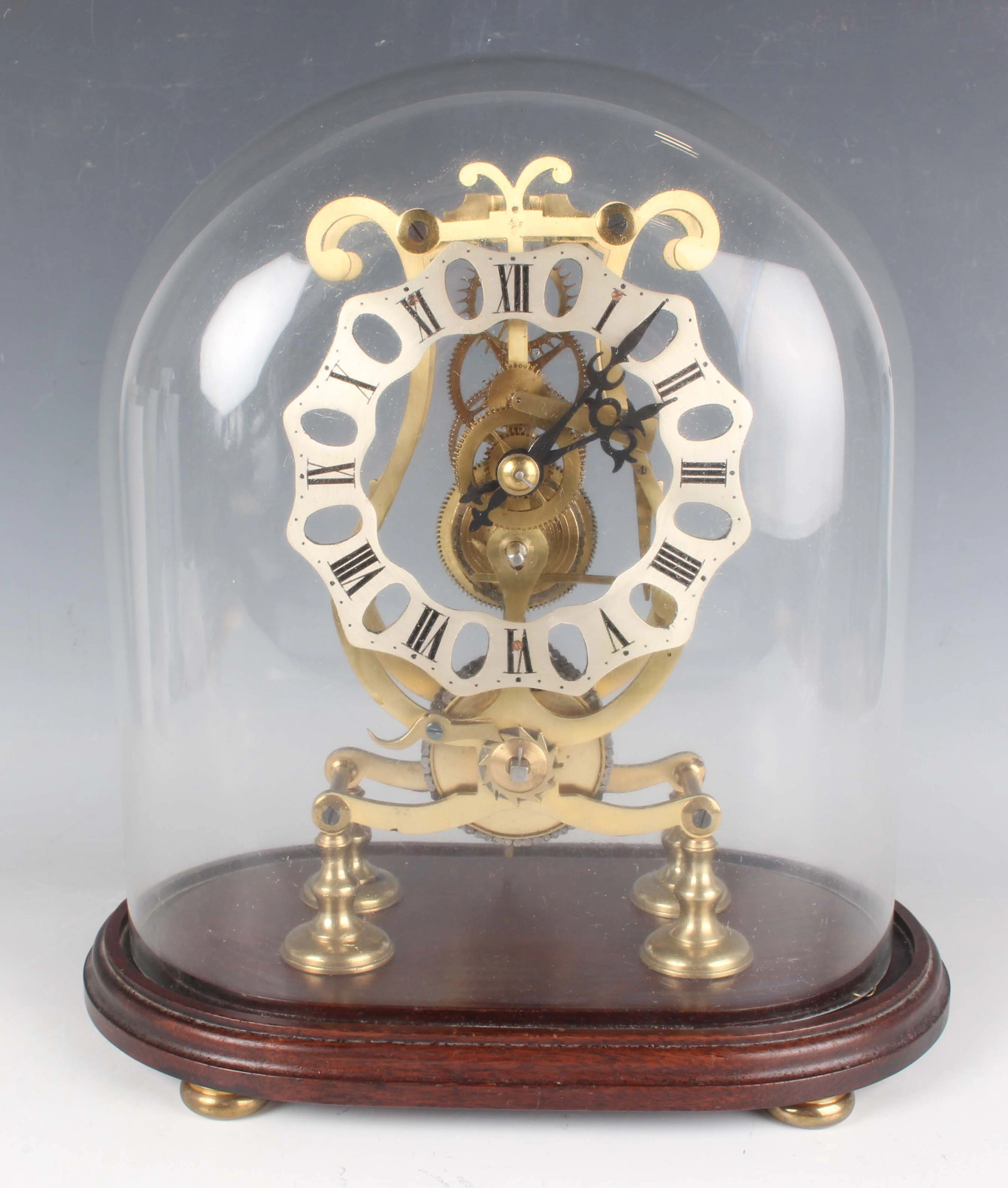 A 20th century brass skeleton timepiece with eight day single fusee