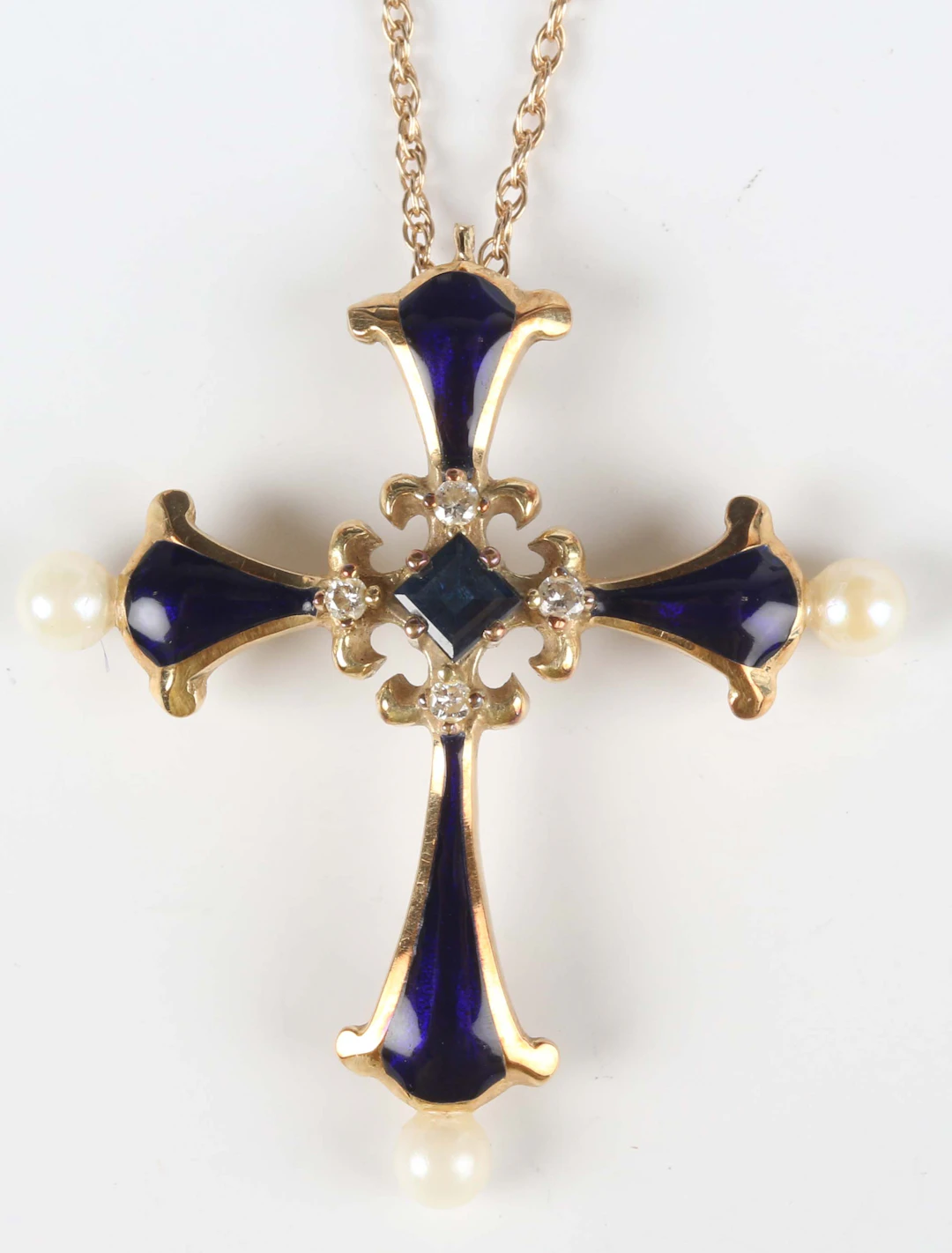 A House of Fabergé gold Midnight Sapphire Cross for The Franklin Mint