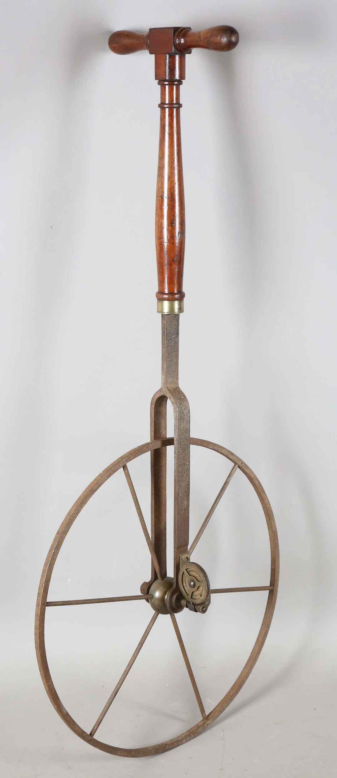A 19th century mahogany handled 'waywiser' or surveyor's wheel, the