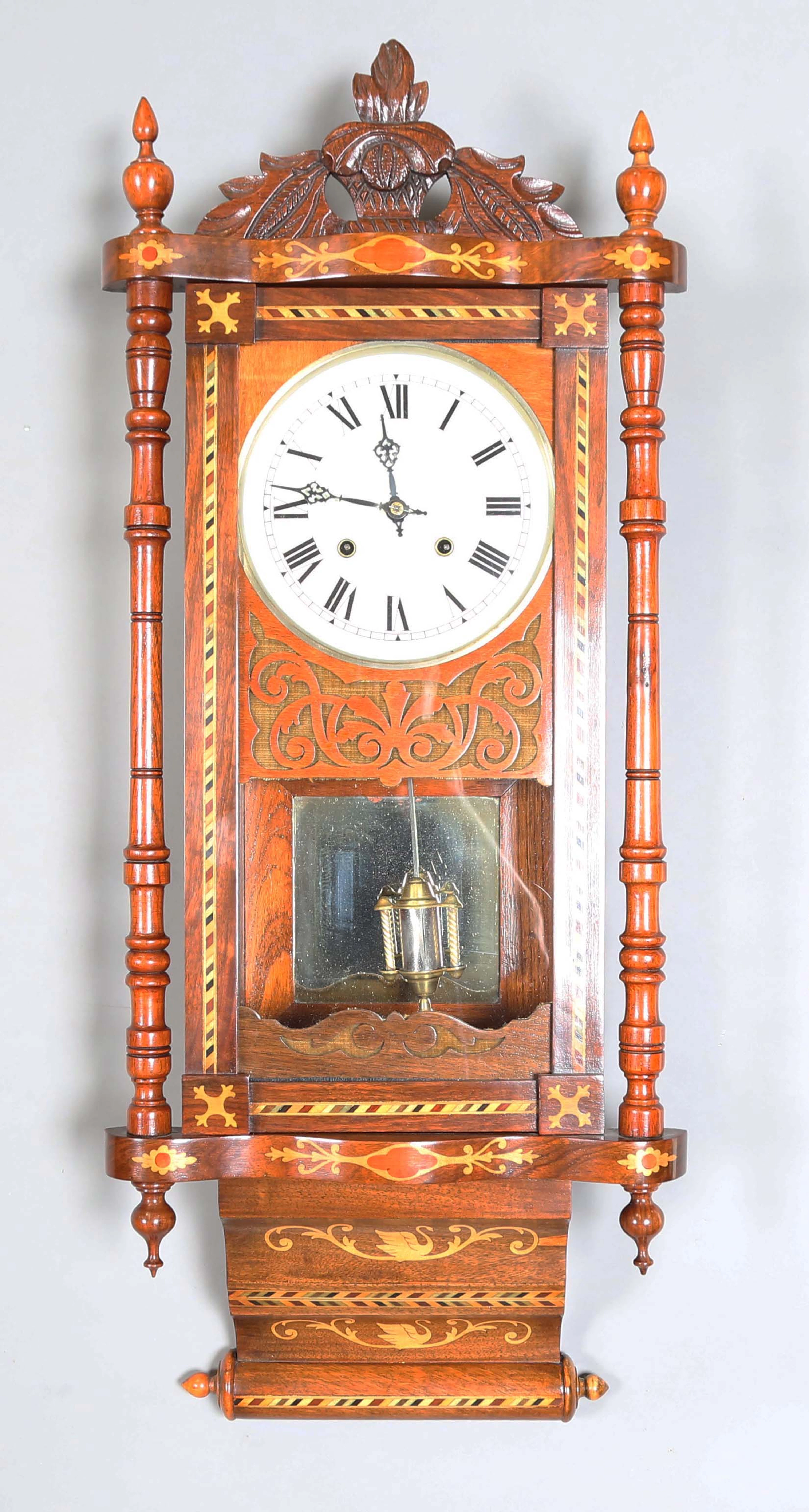 A late 19th century American inlaid walnut wall clock with eight day