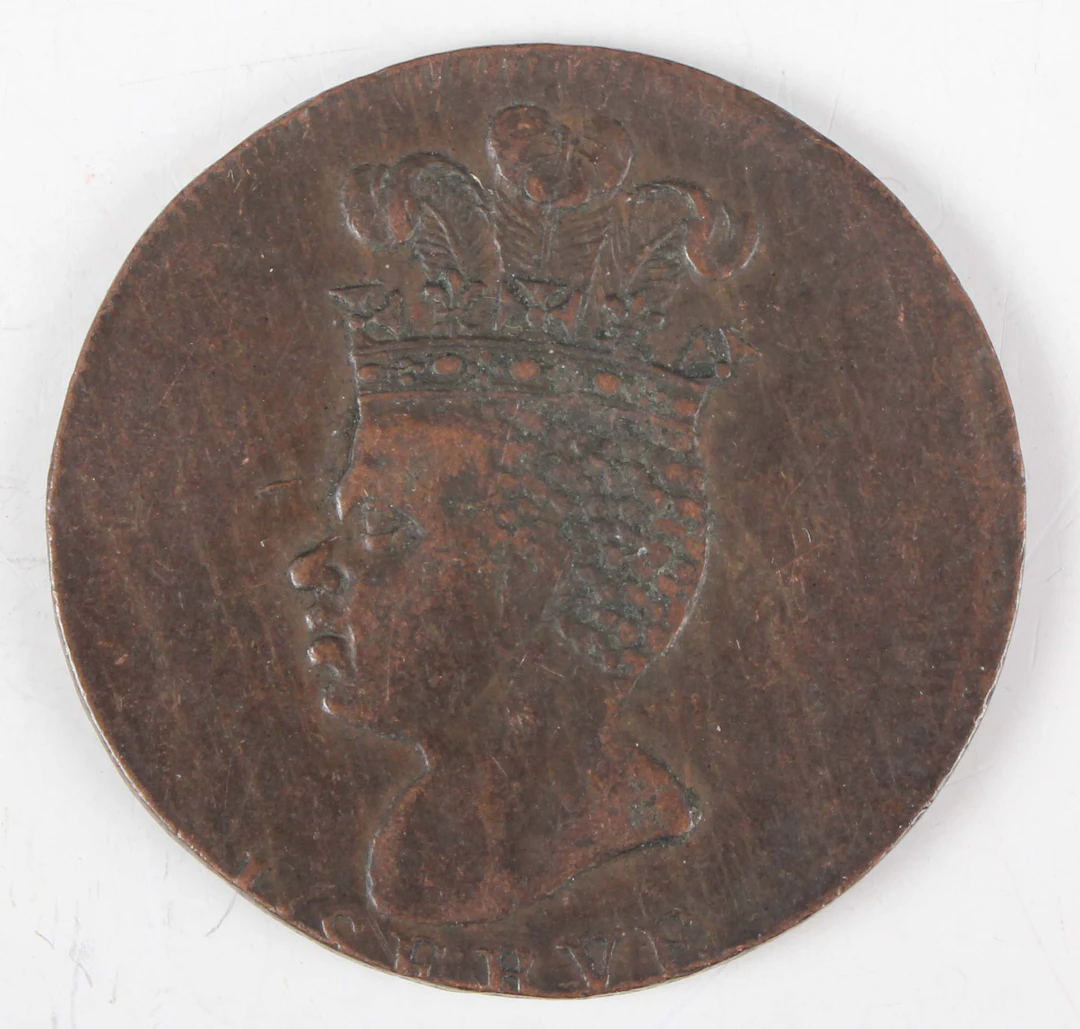 A scarce Barbados one penny 1788, obverse with slave facing left