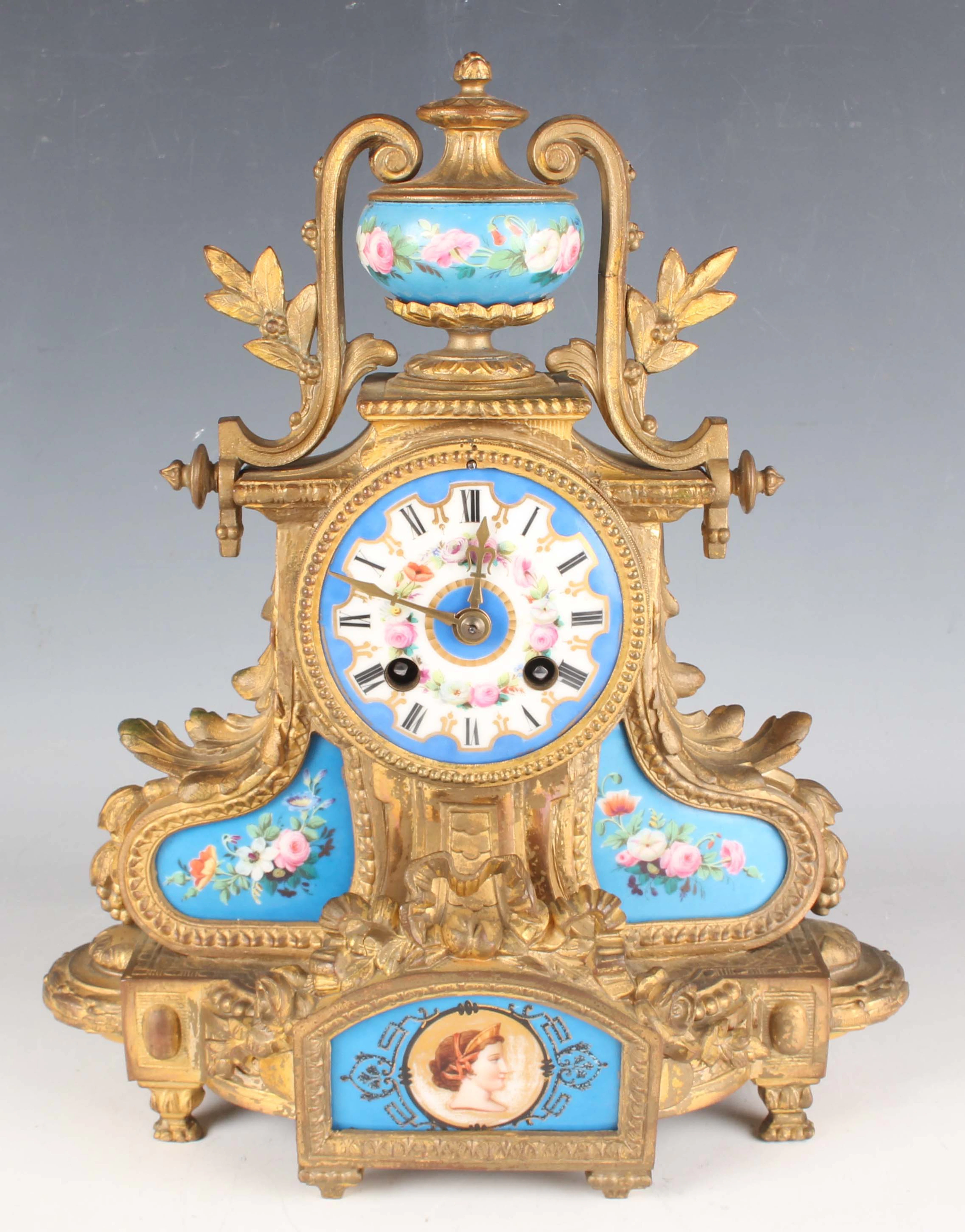 A late 19th century French gilt spelter and porcelain mantel clock