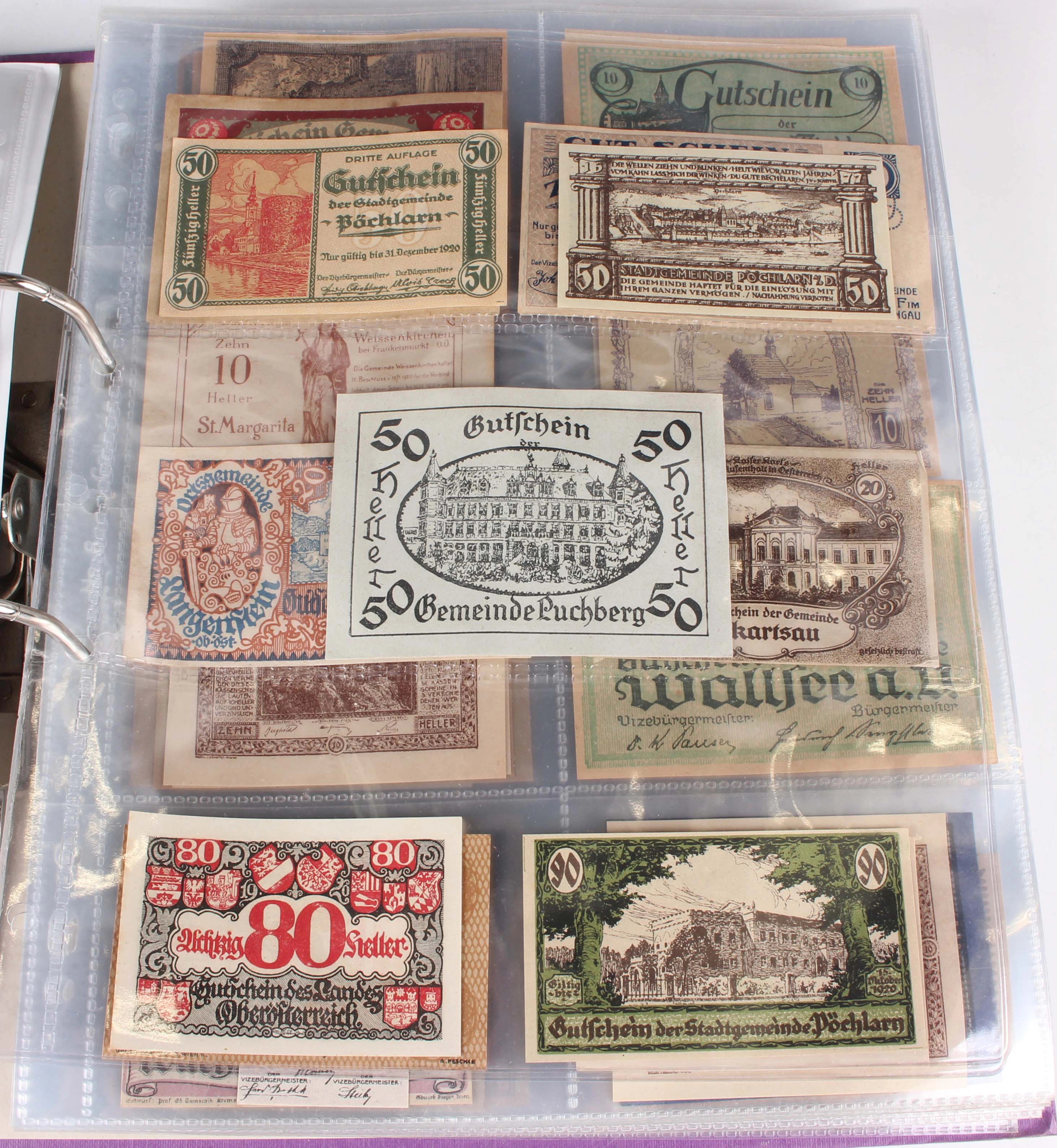A large collection of German notgeld emergency money, within an album.