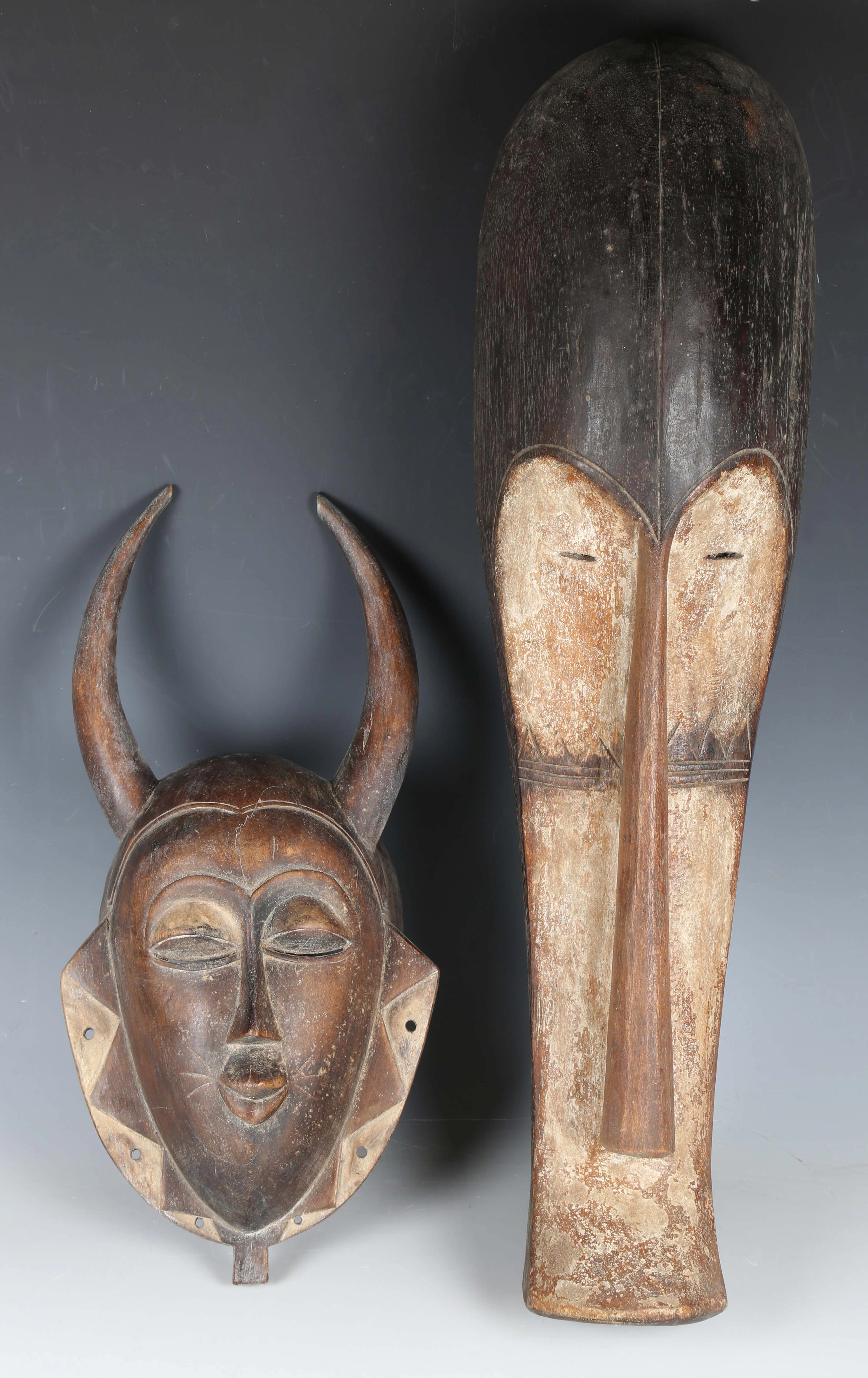 A Fang Ngil mask, Gabon, modelled as an elongated male face, length