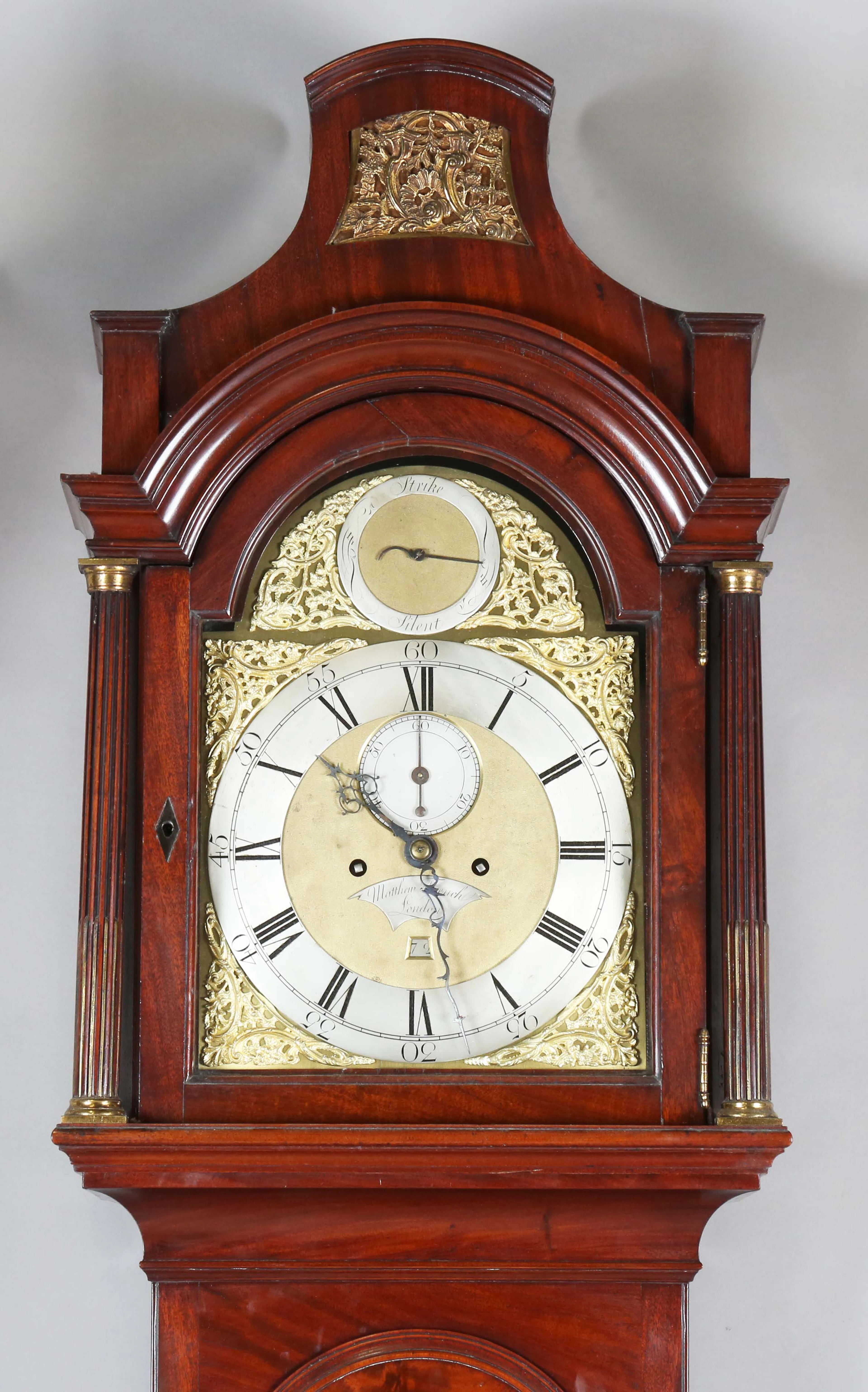 A George III mahogany longcase clock with eight day movement striking