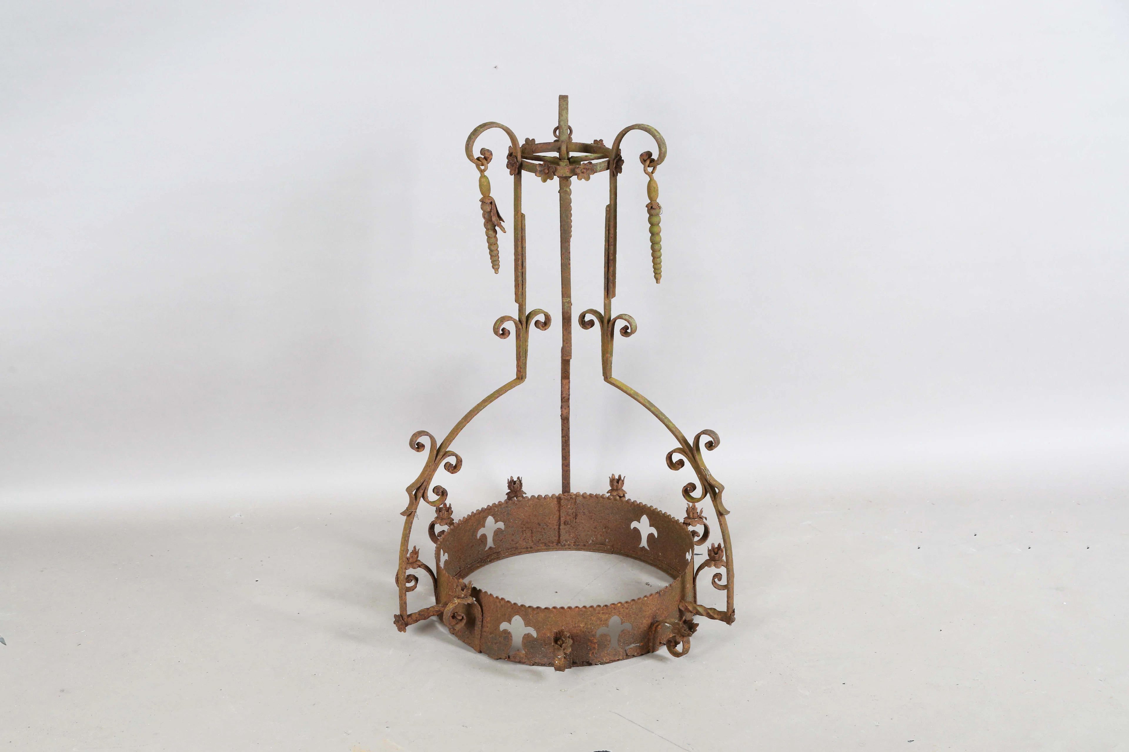 A 19th century Gothic Revival wrought iron hanging chandelier, hung