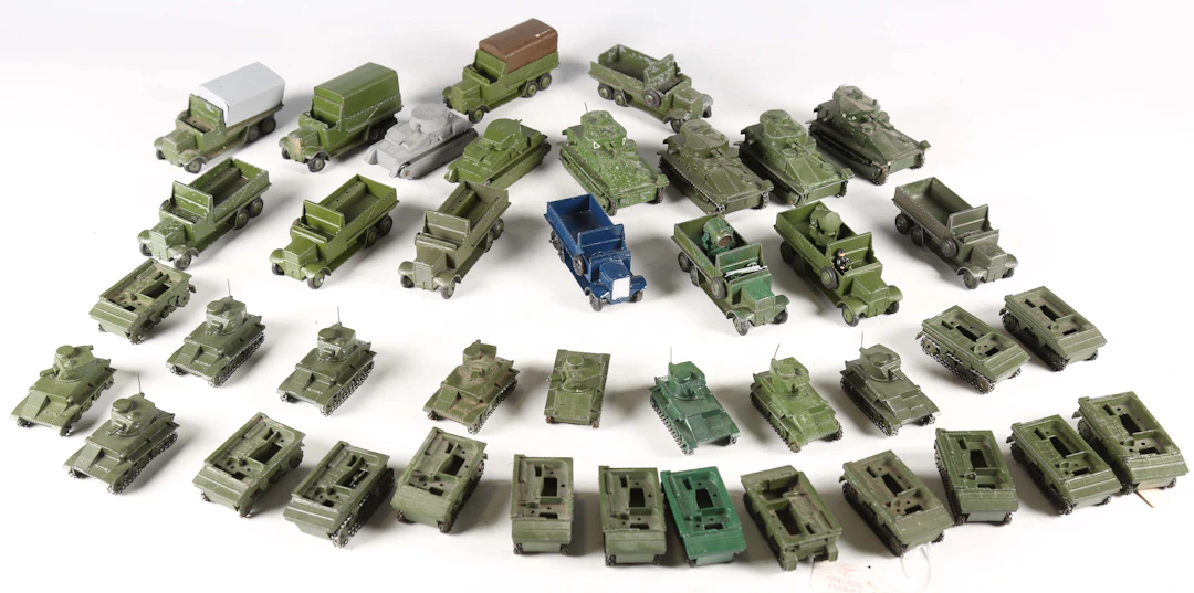 A collection of Dinky Toys tanks and army vehicles, including four