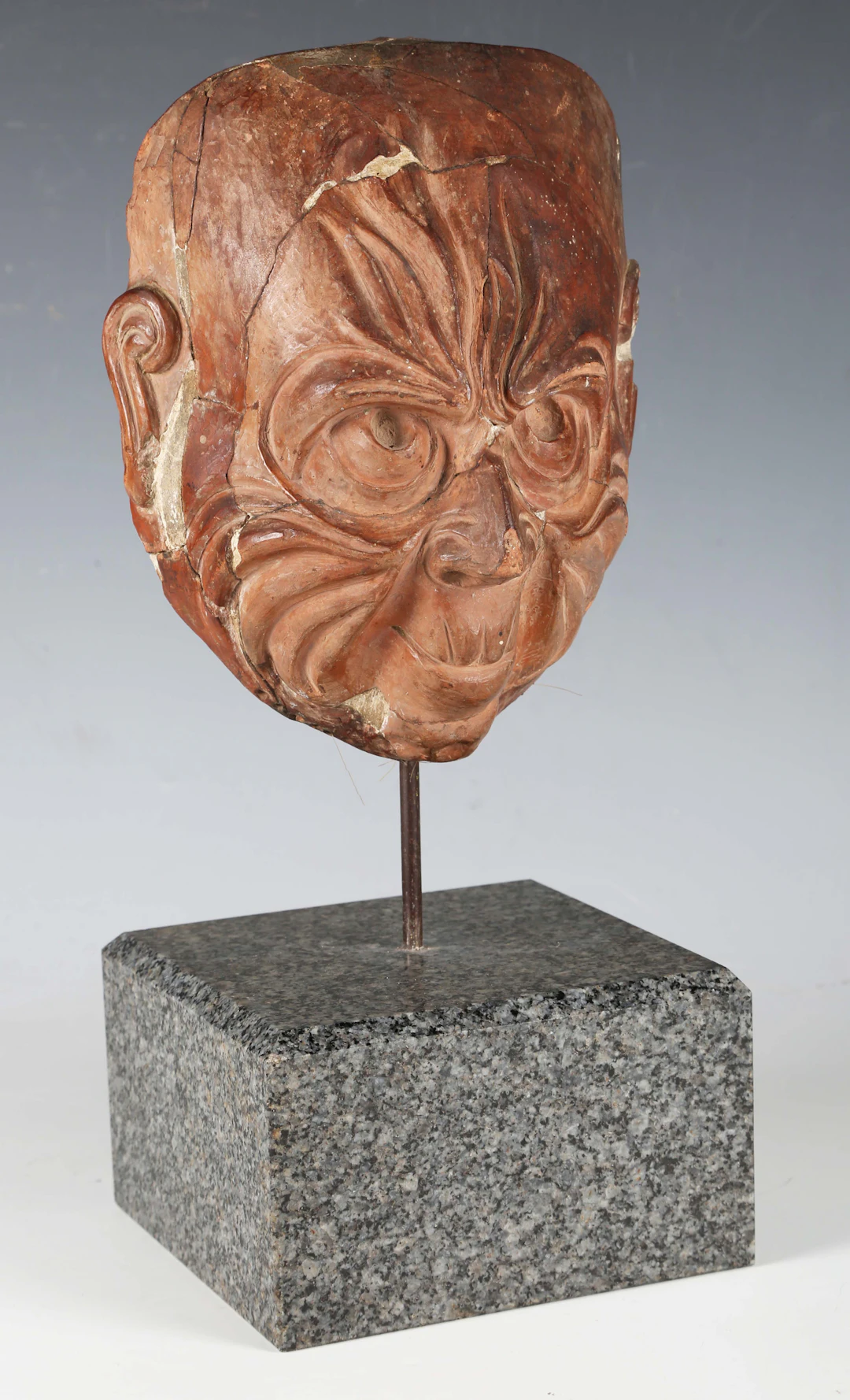 A Japanese terracotta mask, Edo period, modelled as an elderly man