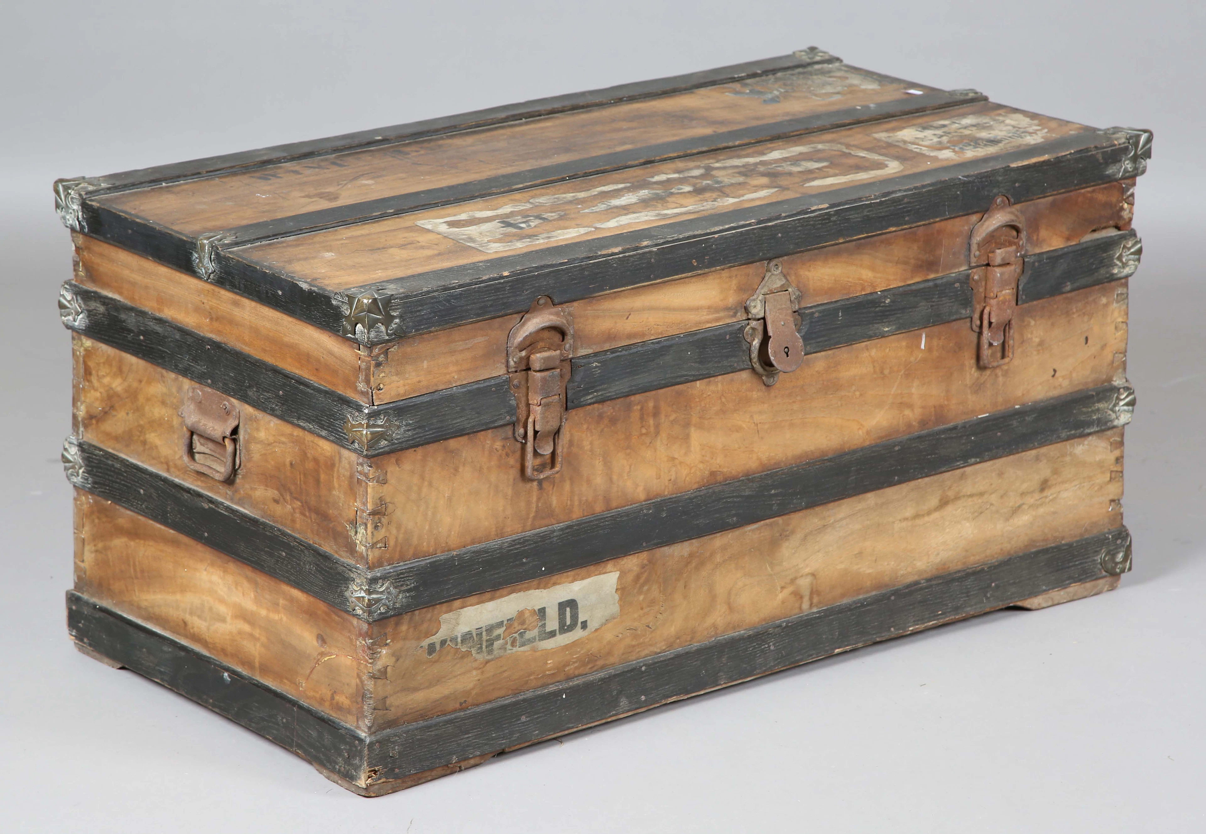 An early 20th century camphor and wooden bound steamer trunk with