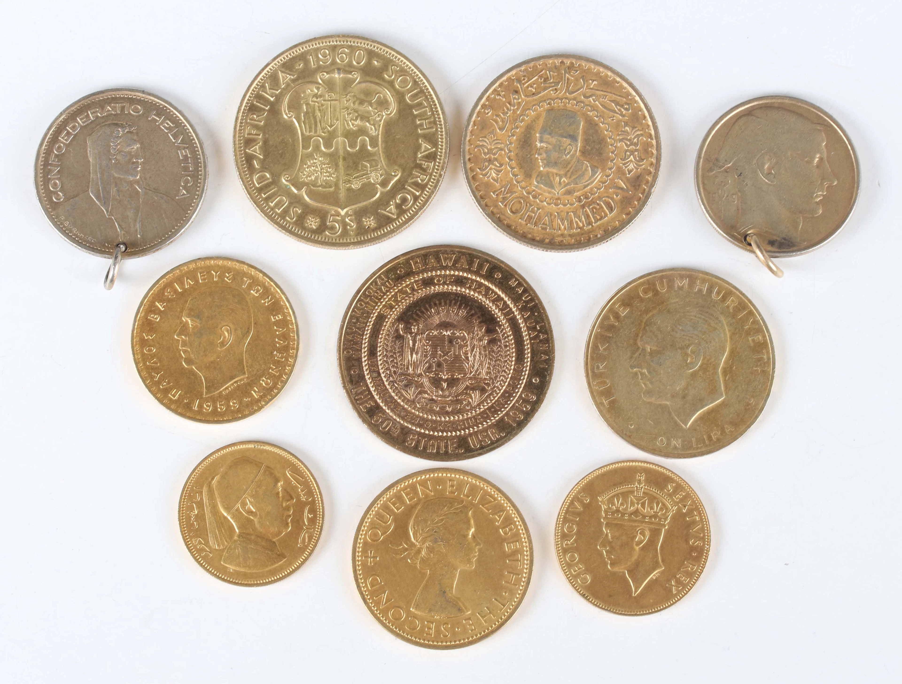 A group of silver-gilt and gilt base metal coins and medallions, including