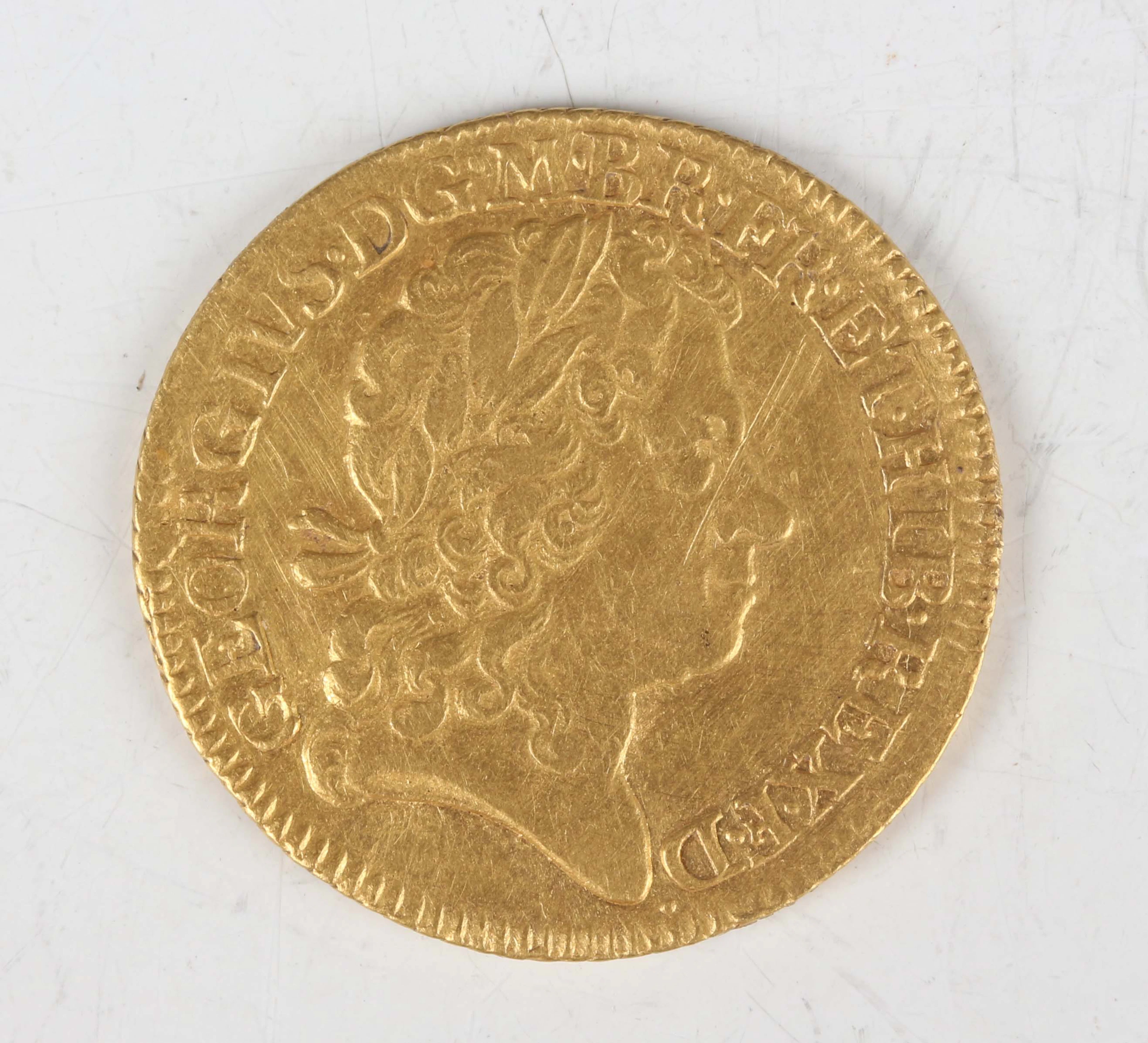A scarce George I guinea 1721, fourth bust, tie with loop to hair