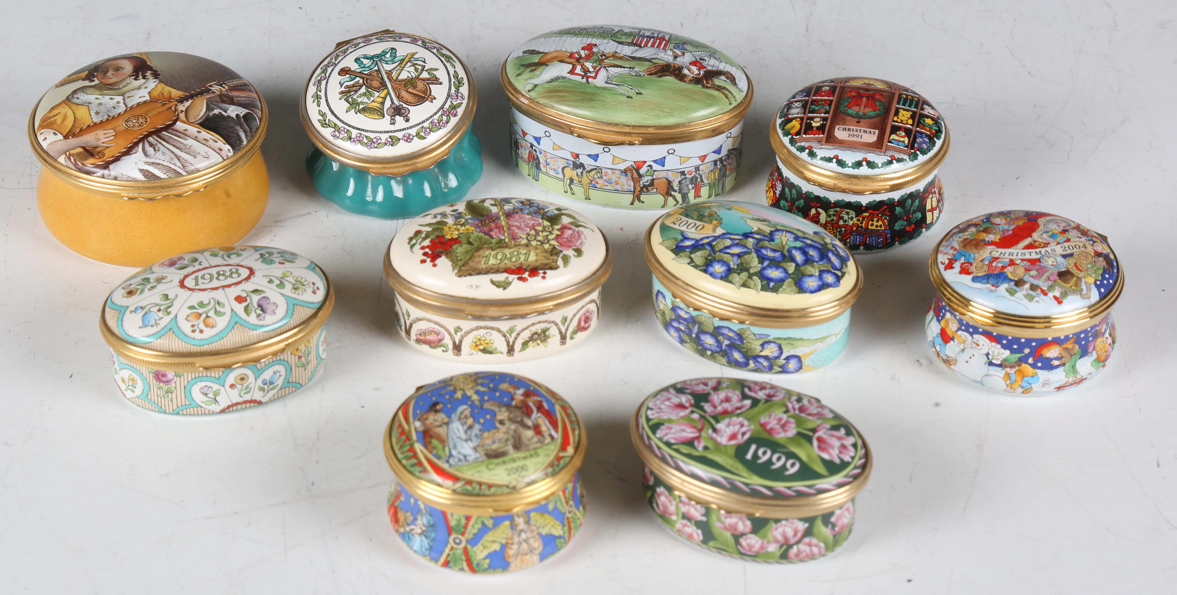 A group of eight Halcyon Days enamel boxes and two similar enamel boxes.