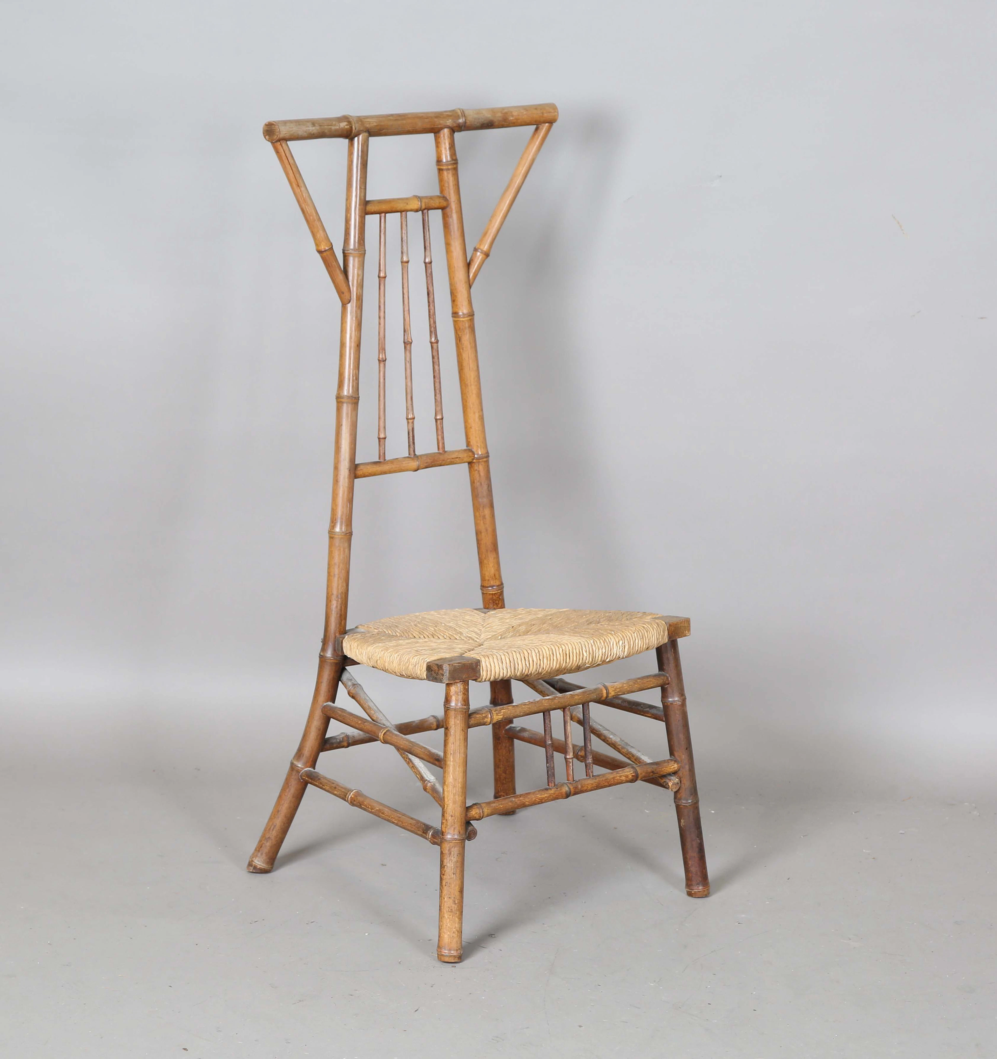 A late Victorian japonaiserie bamboo framed side chair with a rush