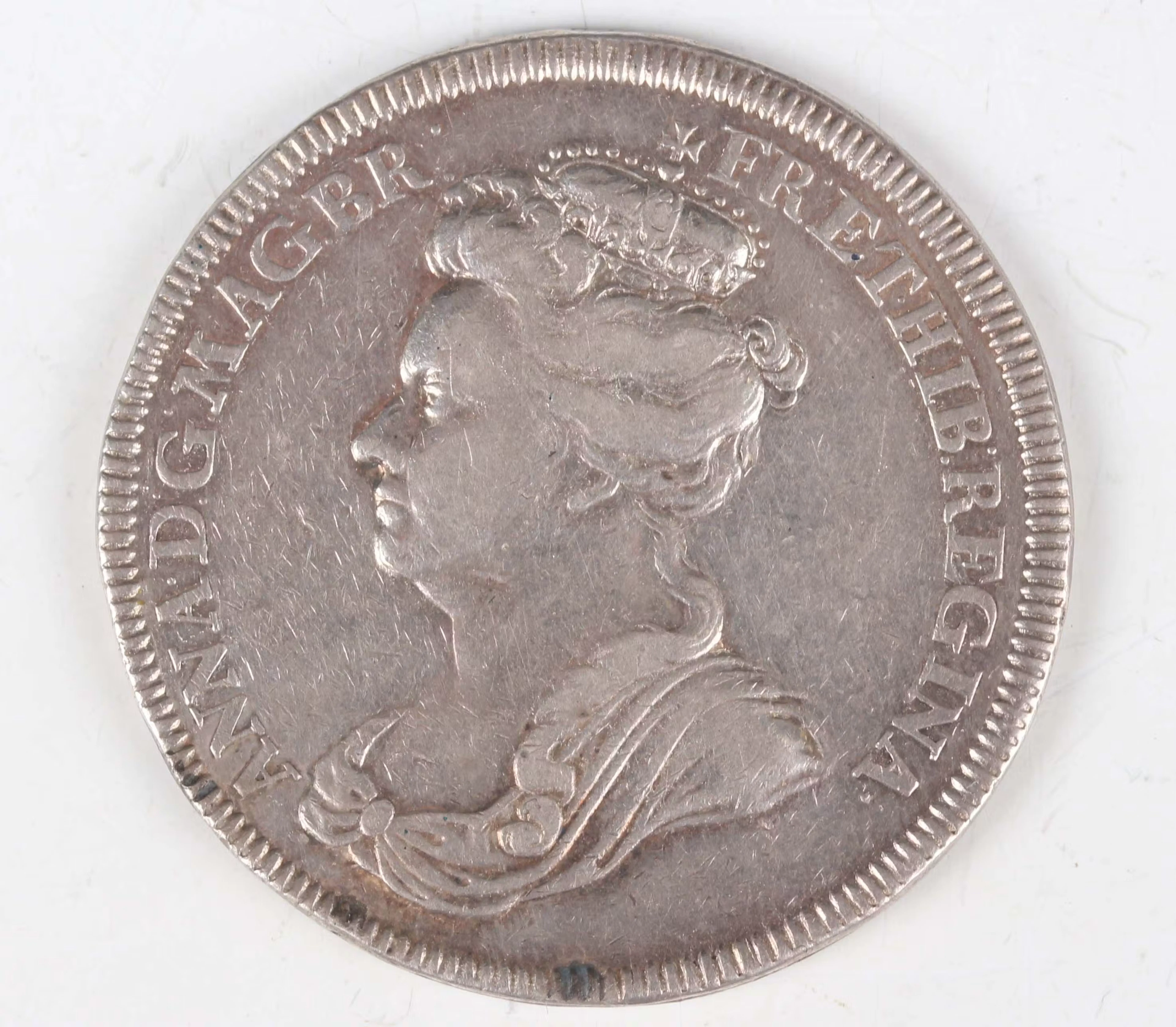 A scarce Queen Anne silver medallion celebrating her accession 1702