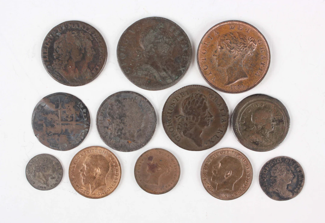 A group of English and Irish coins, comprising two halfpennies, 1773