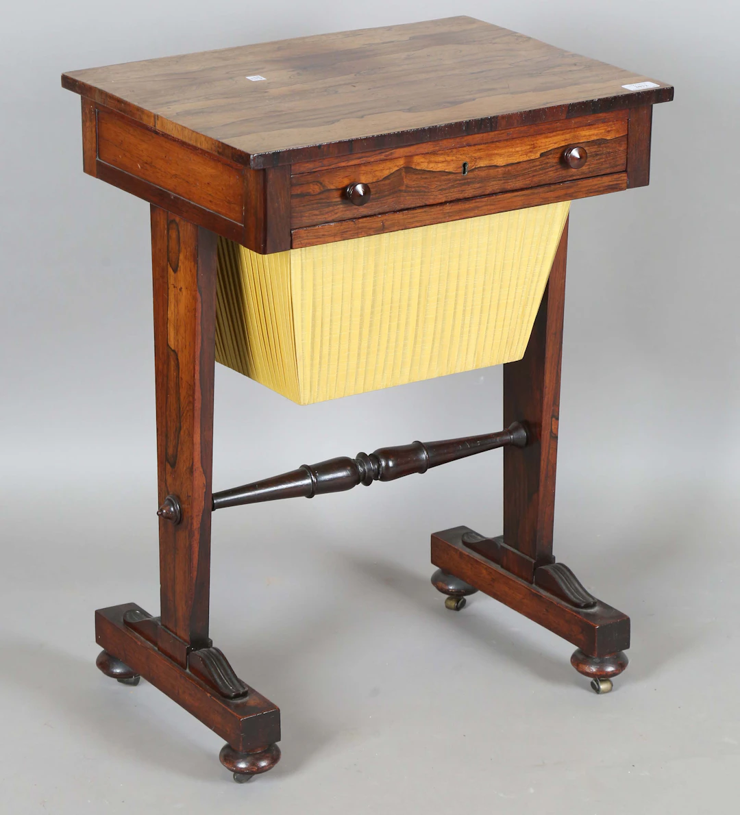 A Regency rosewood work table, fitted with a single frieze drawer