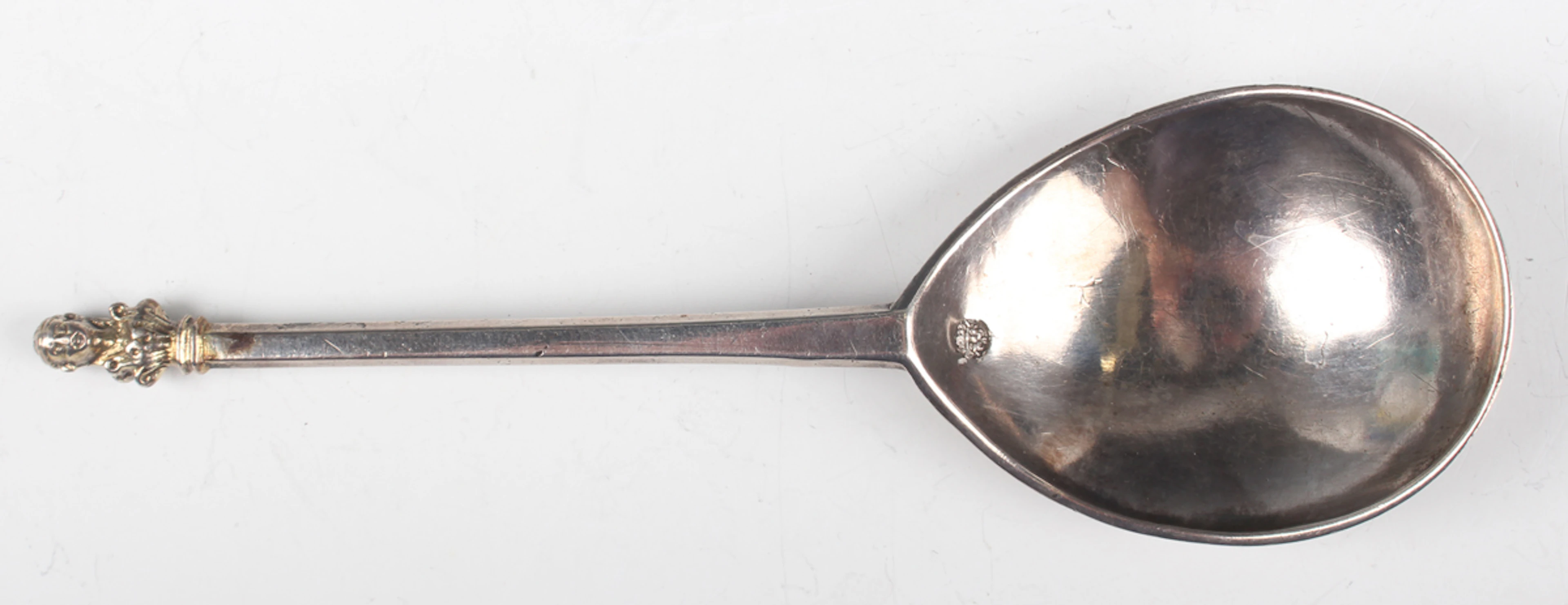 A Henry VIII silver maidenhead spoon, the tapered hexagonal stem with