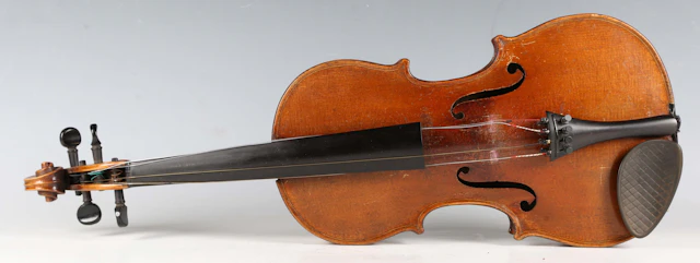 A violin with two-piece back, bearing interior label detailed 'Antonius