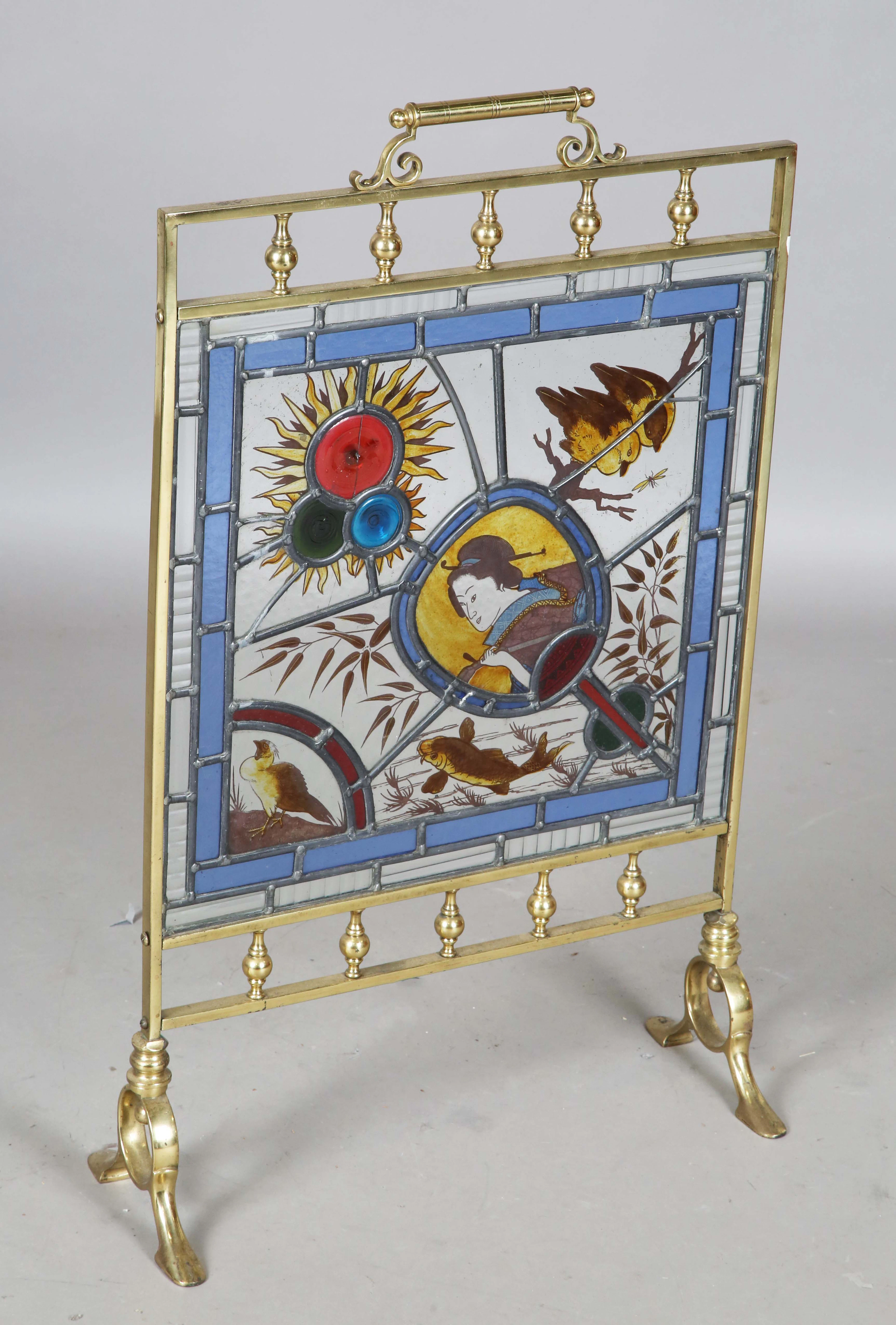 A late Victorian Aesthetic Movement brass framed and stained glass