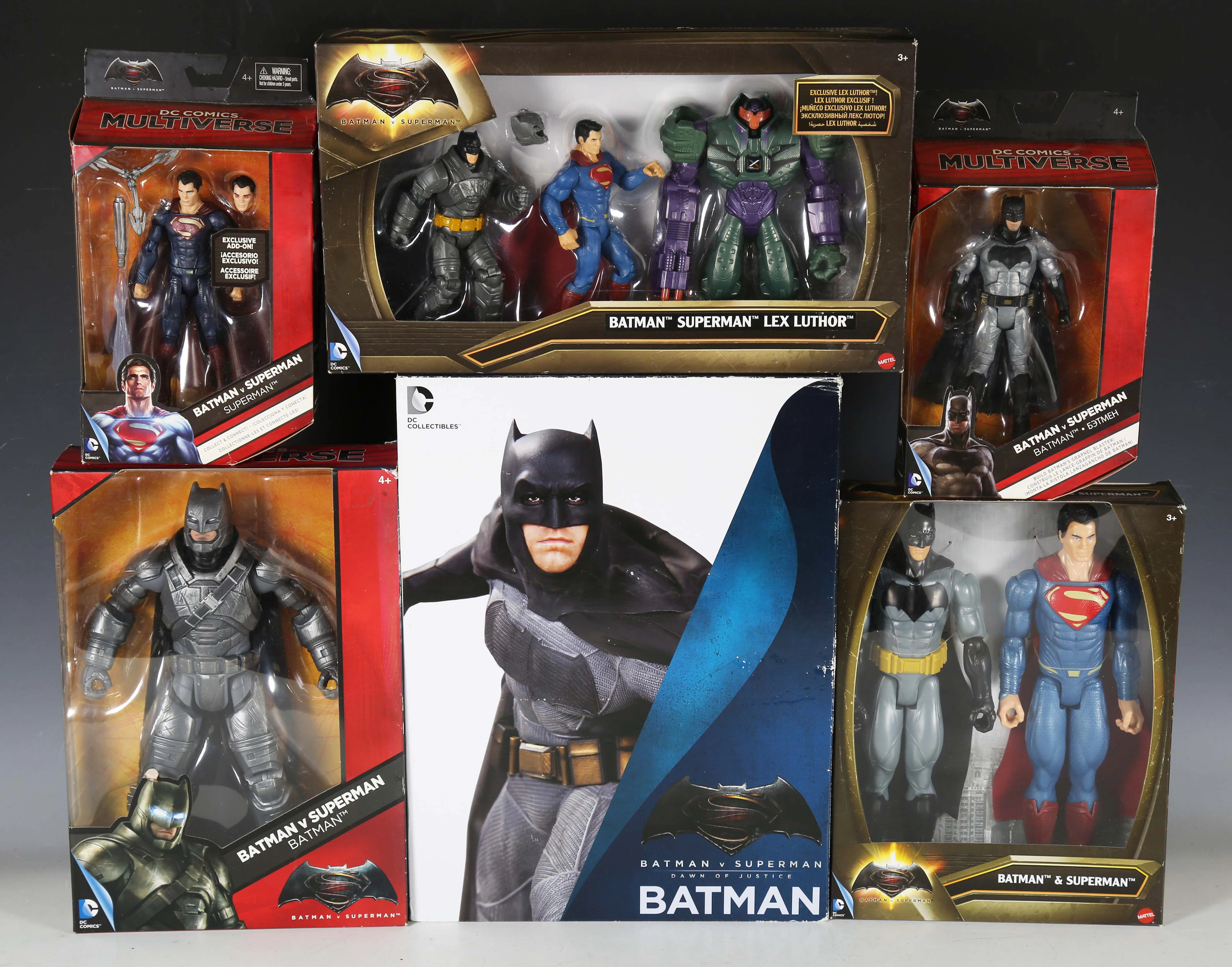 A collection of Batman v Superman action figures, including Mattel