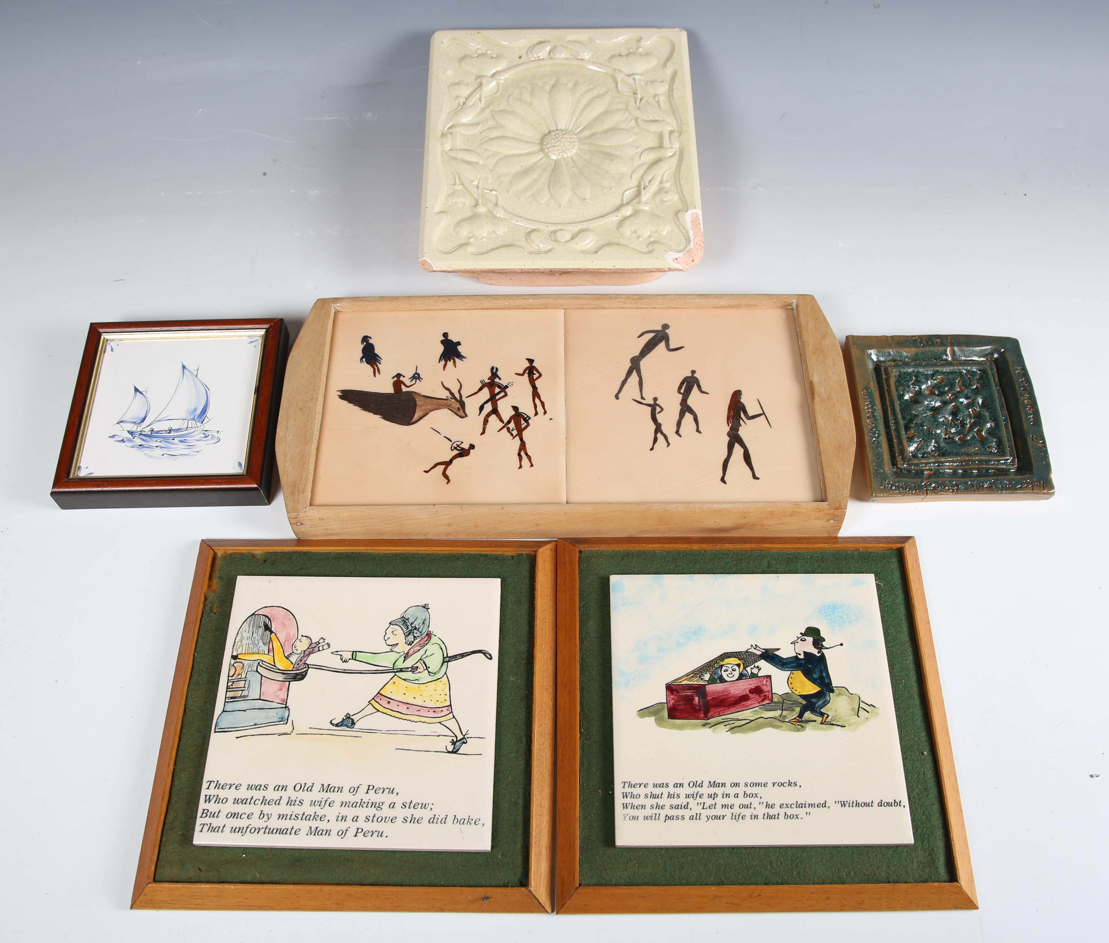 A large mixed group of assorted tiles, tile panels and tiled trays