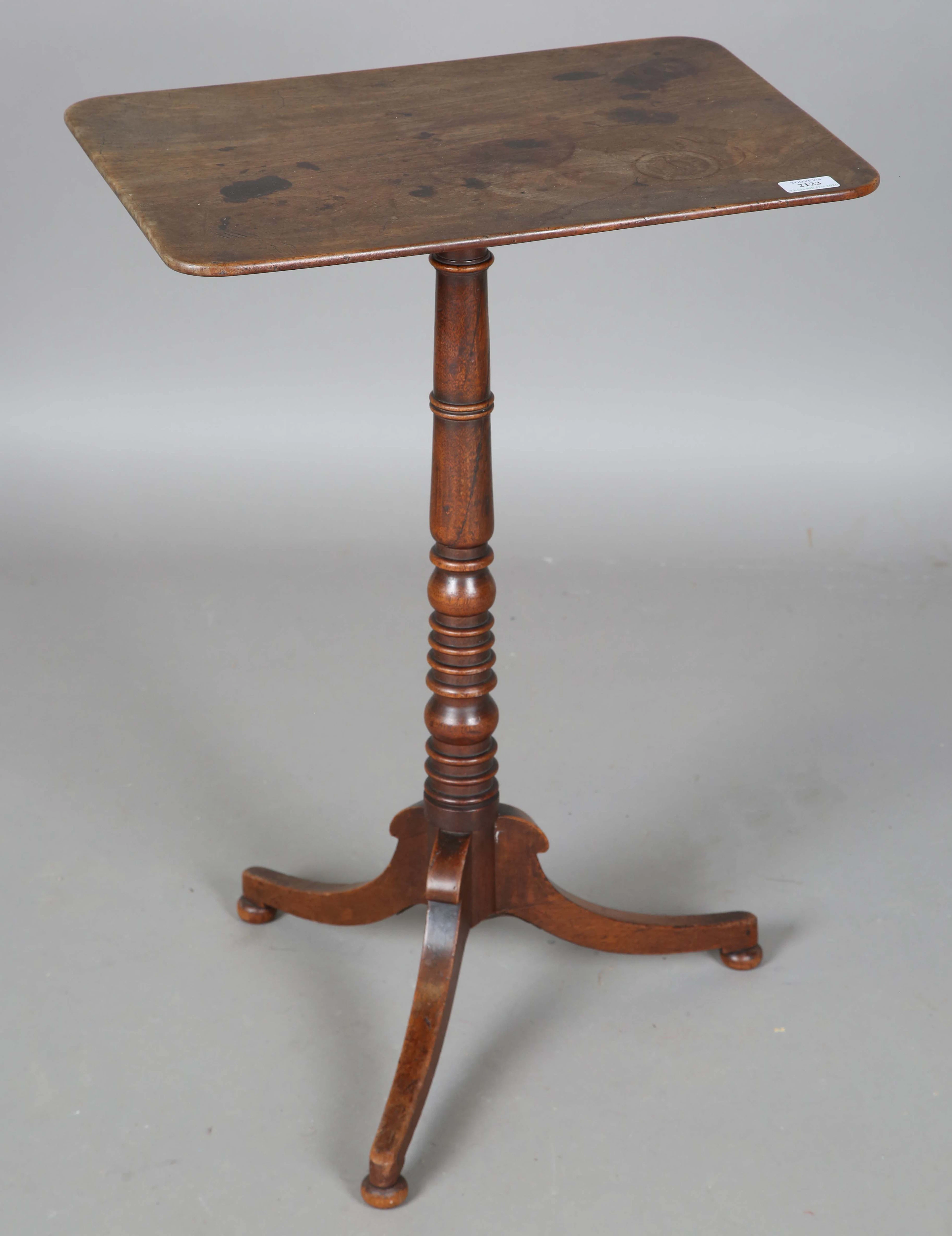 A George IV mahogany rectangular wine table with a ring turned stem