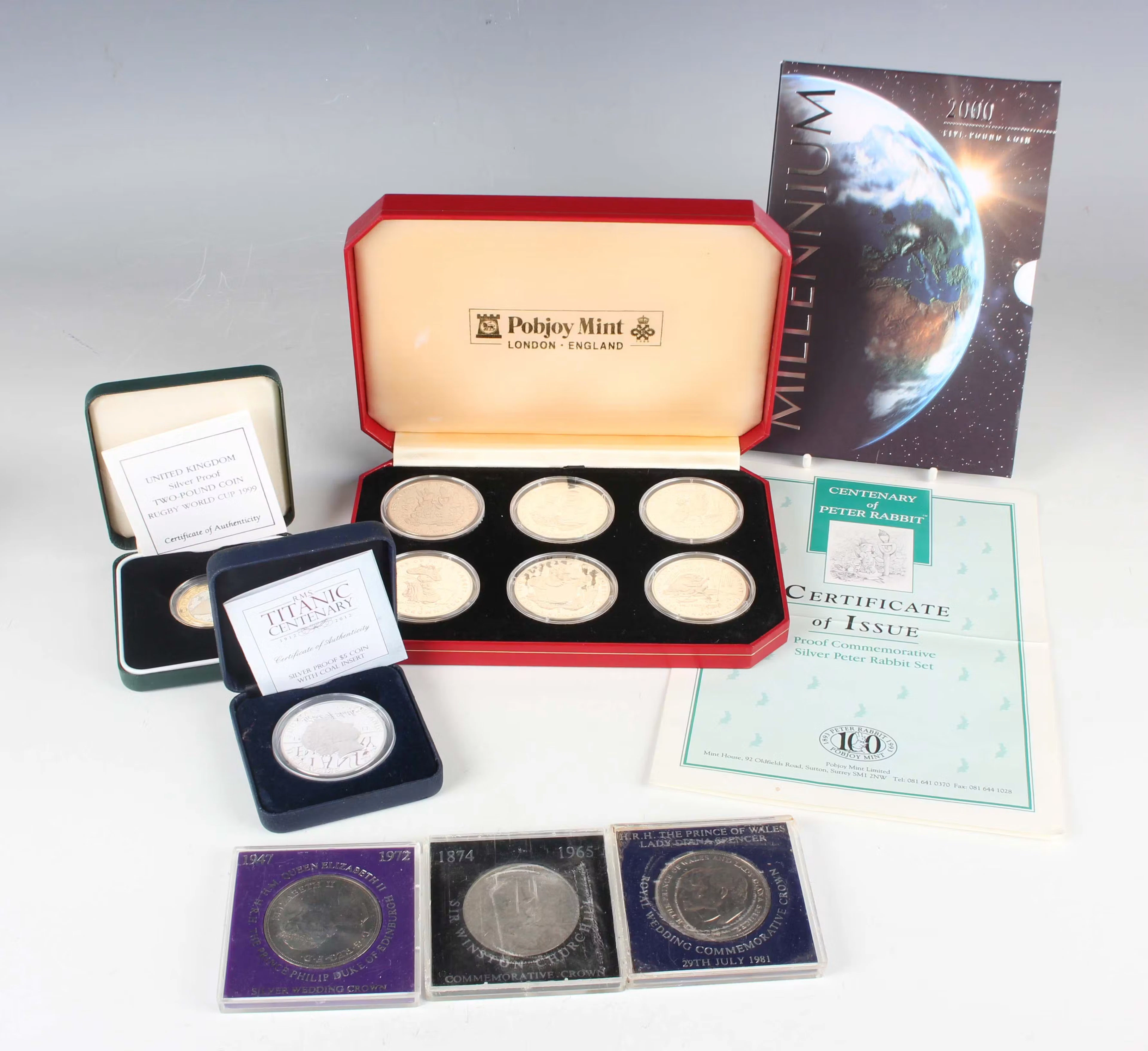 A group of coins, comprising a Cook Islands Elizabeth II silver proof