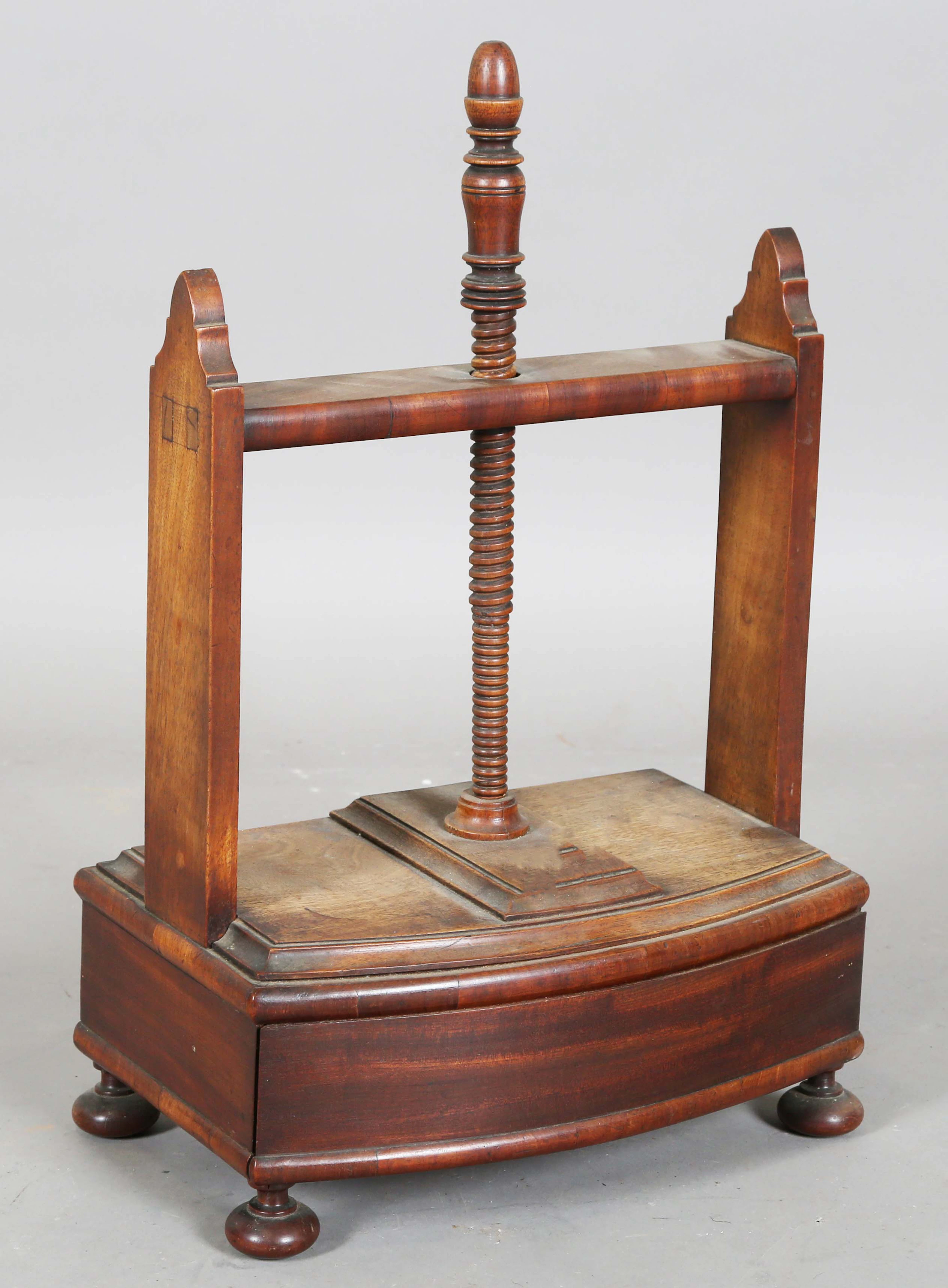 A small 19th century mahogany desk-top bookpress, height 53cm, width