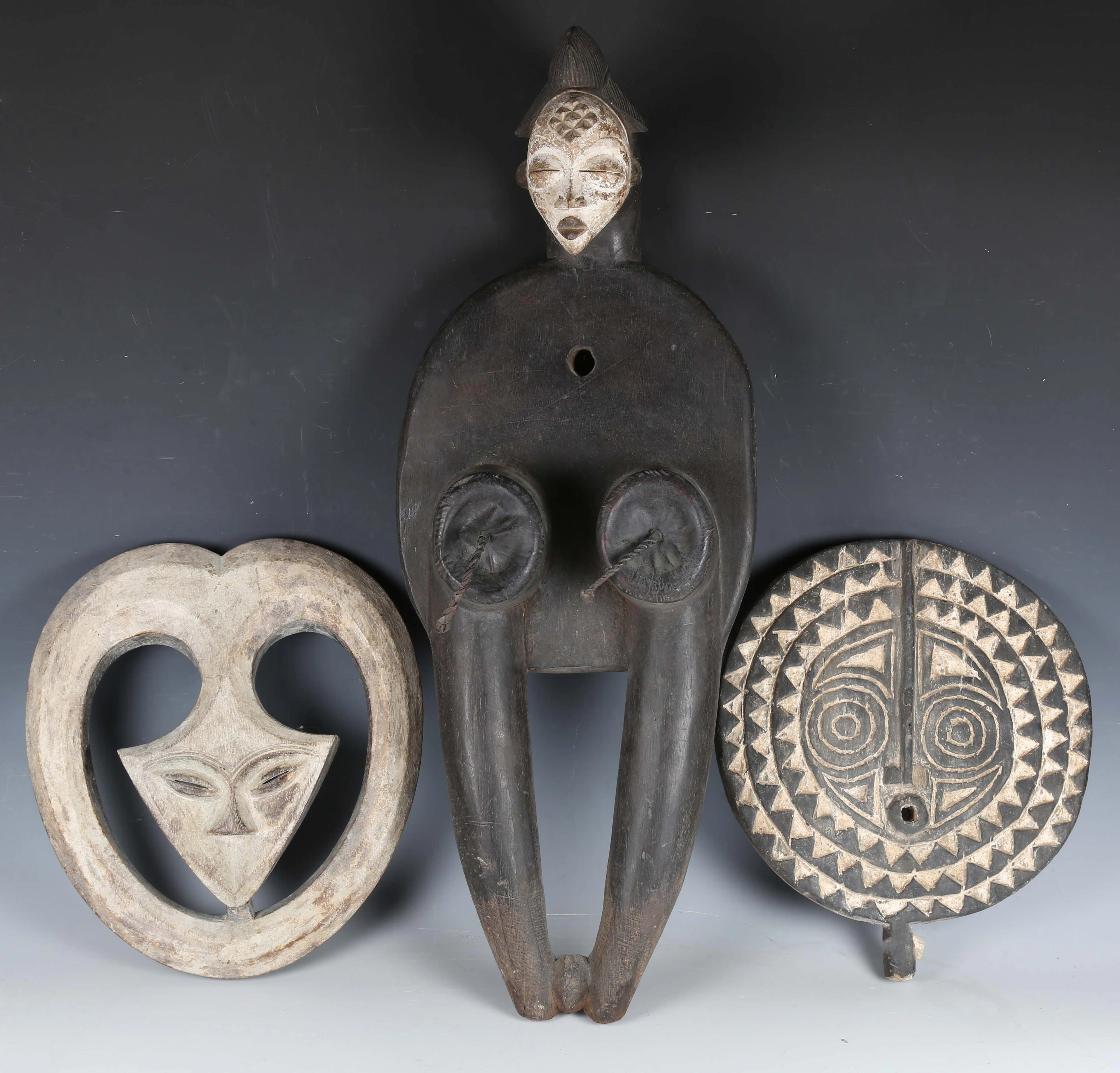 A model of an African Punu figural blacksmith's bellows, Gabon, modelled