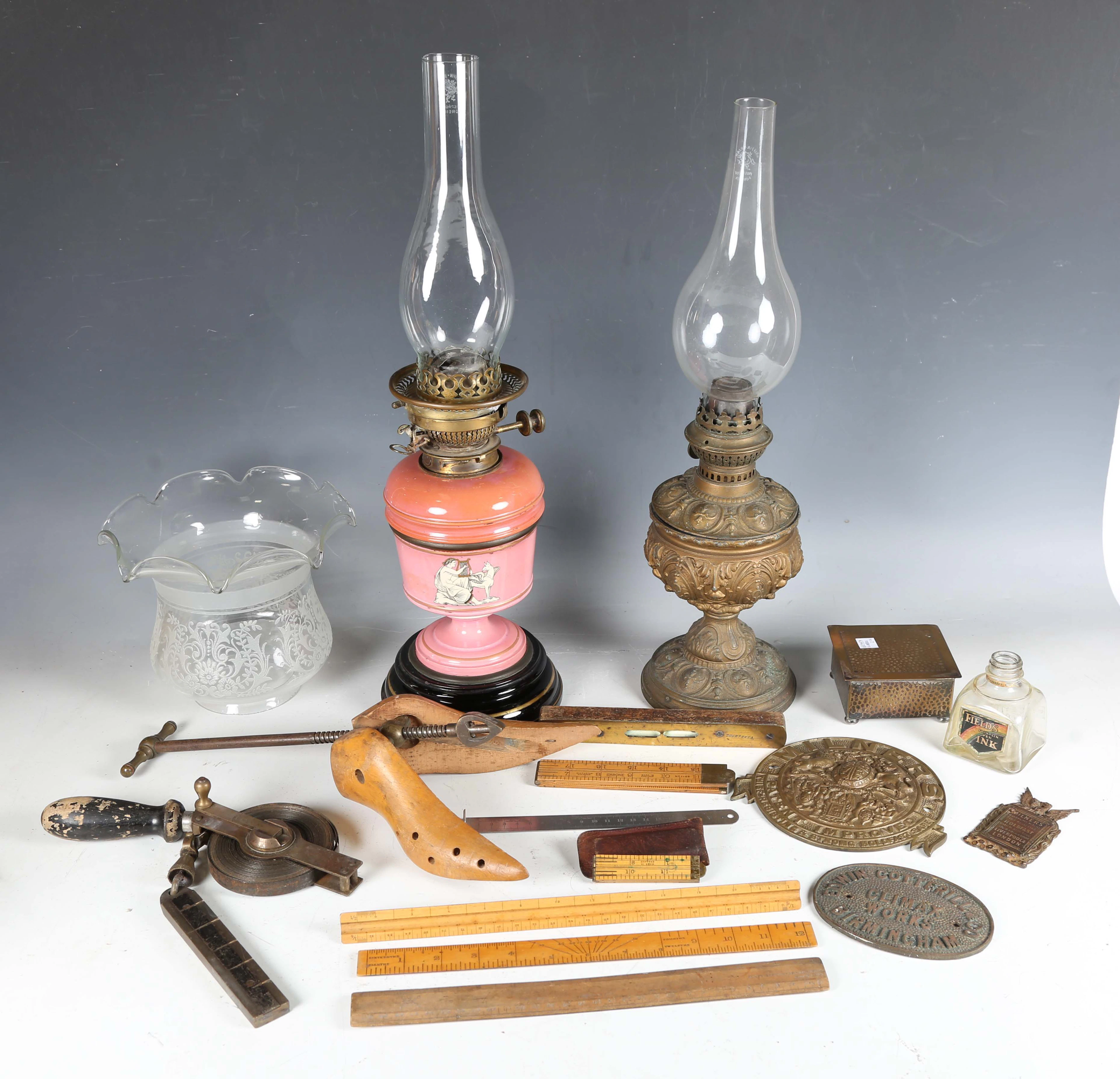 A mixed group of collectors' items, including two Victorian oil lamps