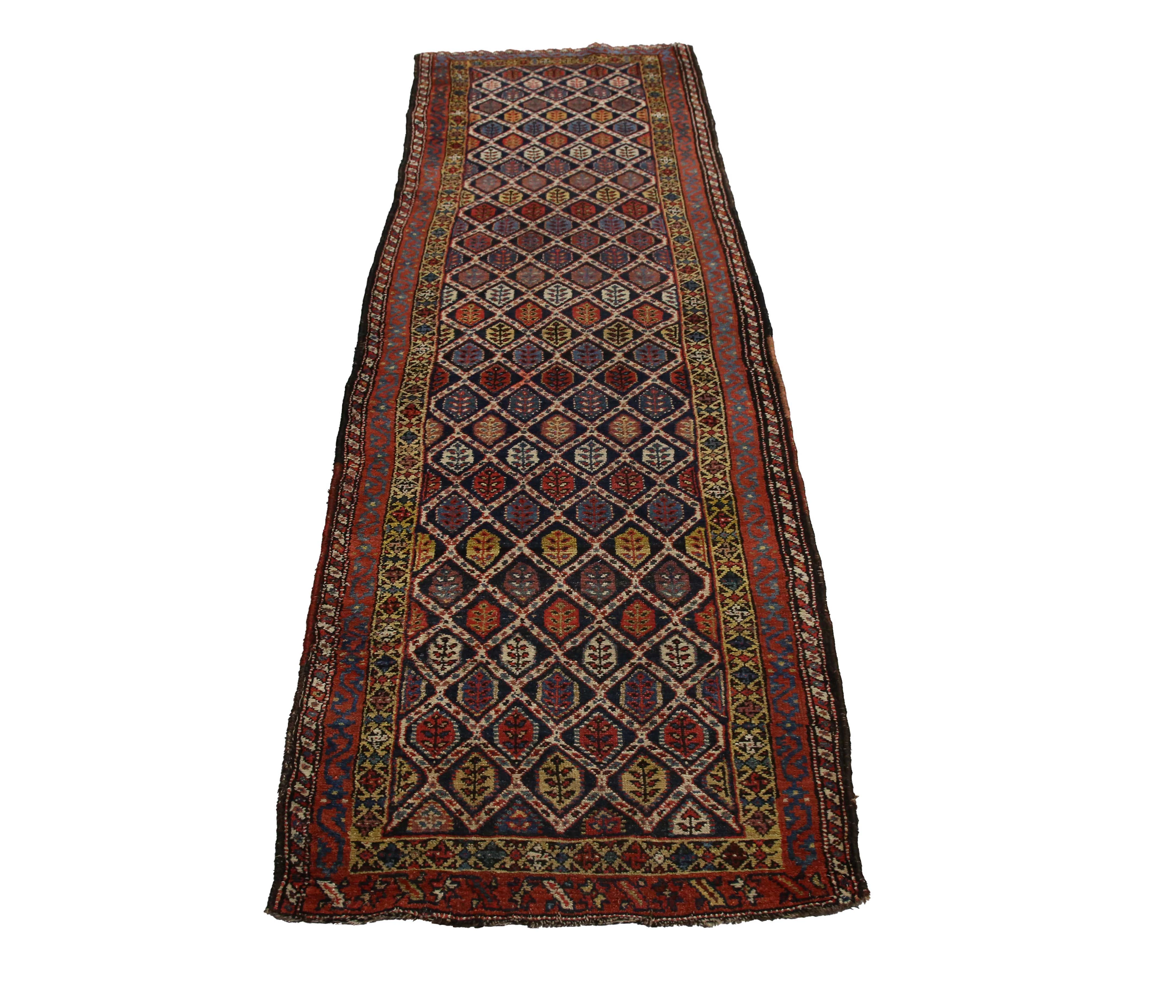 A Kurdish runner, early 20th century, the polychrome floral lattice