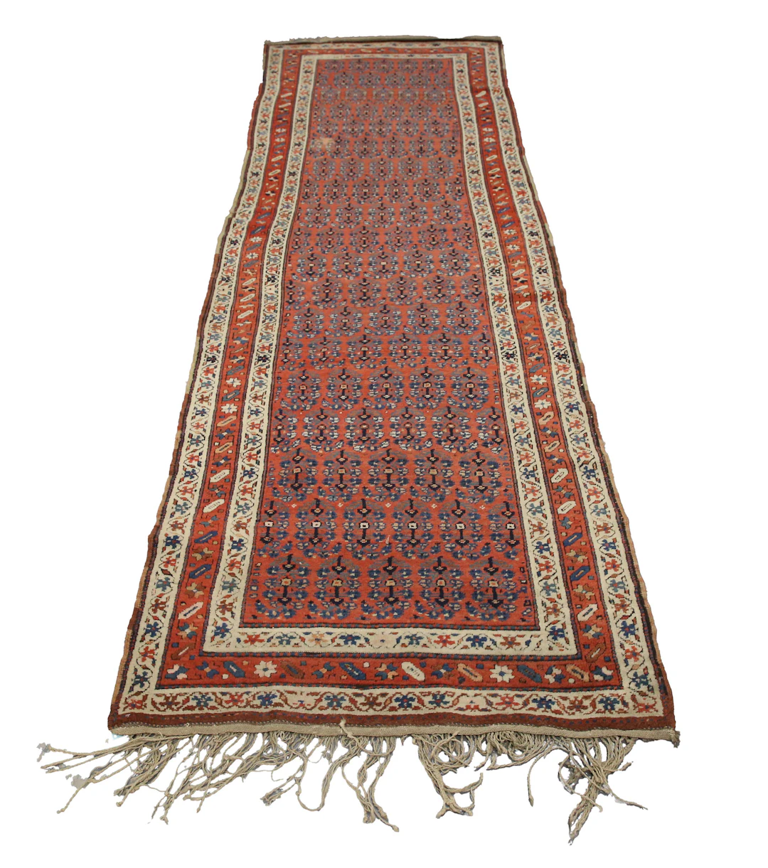 A North-west Persian runner, early 20th century, dated 1325 (1907-1908)