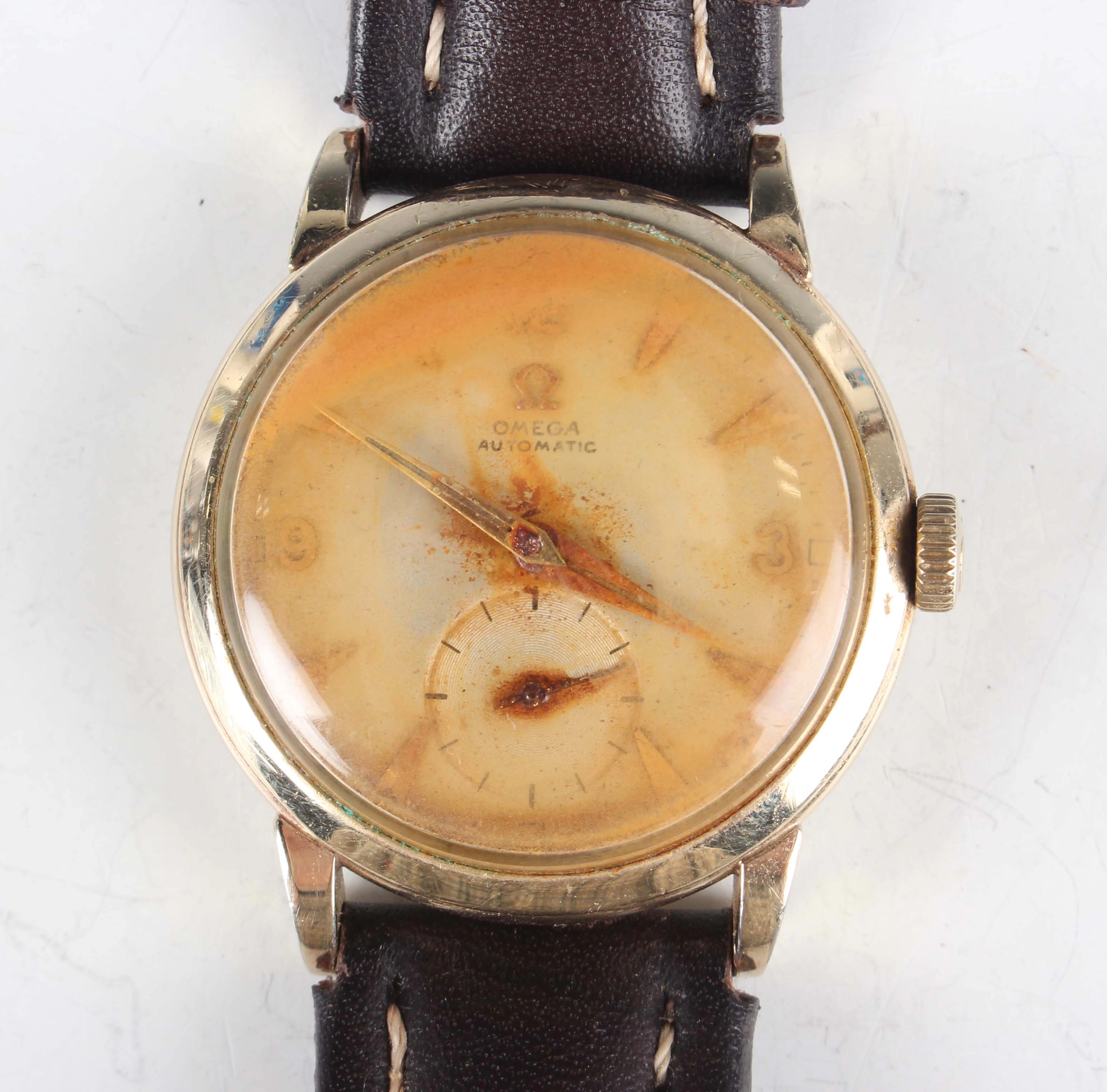 An Omega Automatic gilt metal circular cased gentleman's wristwatch