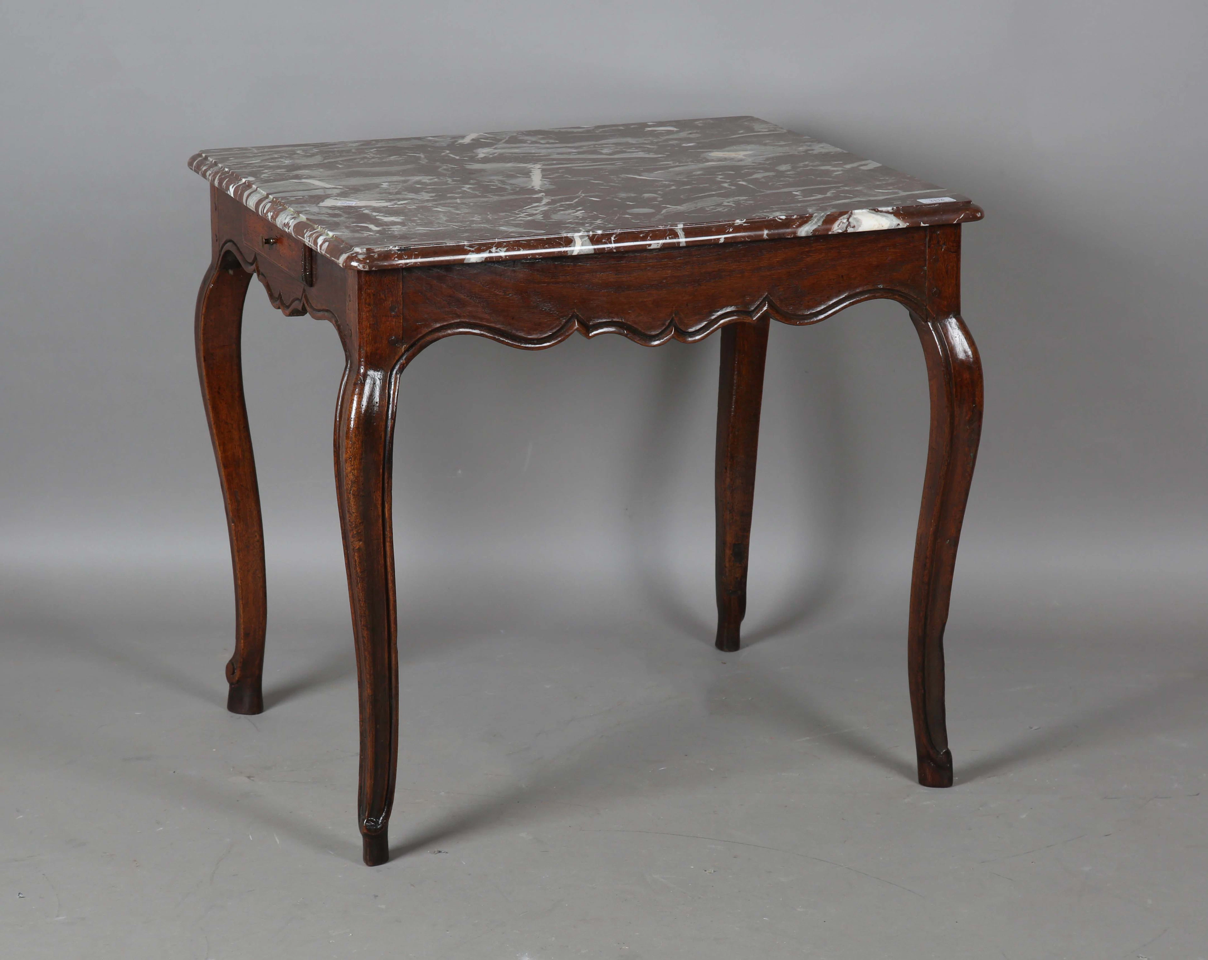 An 18th century French provincial walnut occasional table with a later