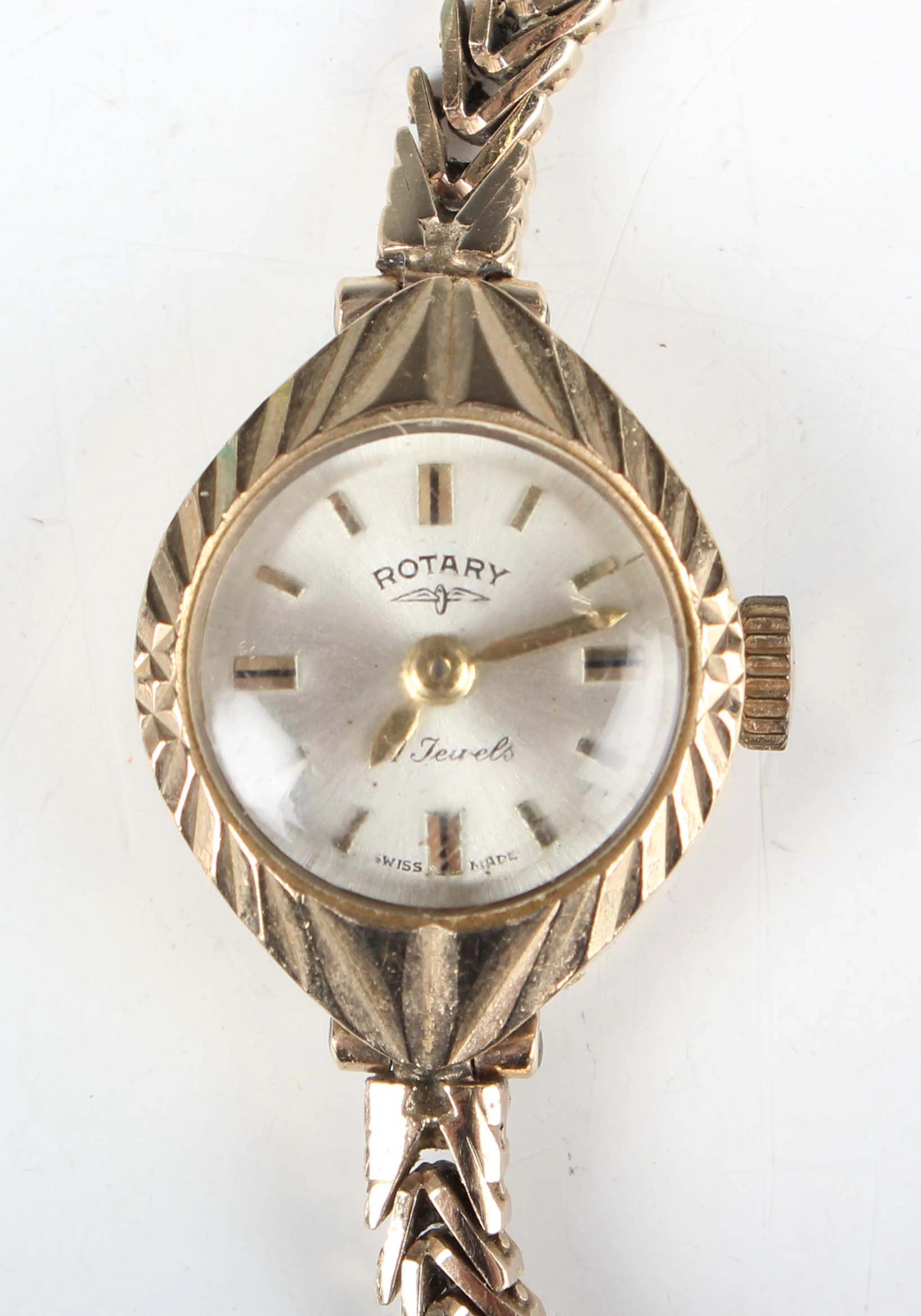 A Rotary 9ct gold lady's bracelet wristwatch, the signed silvered