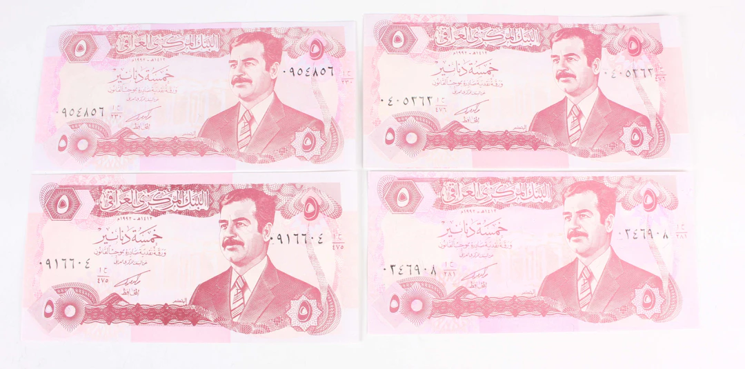 A large collection of Middle Eastern banknotes, including Afghanistan
