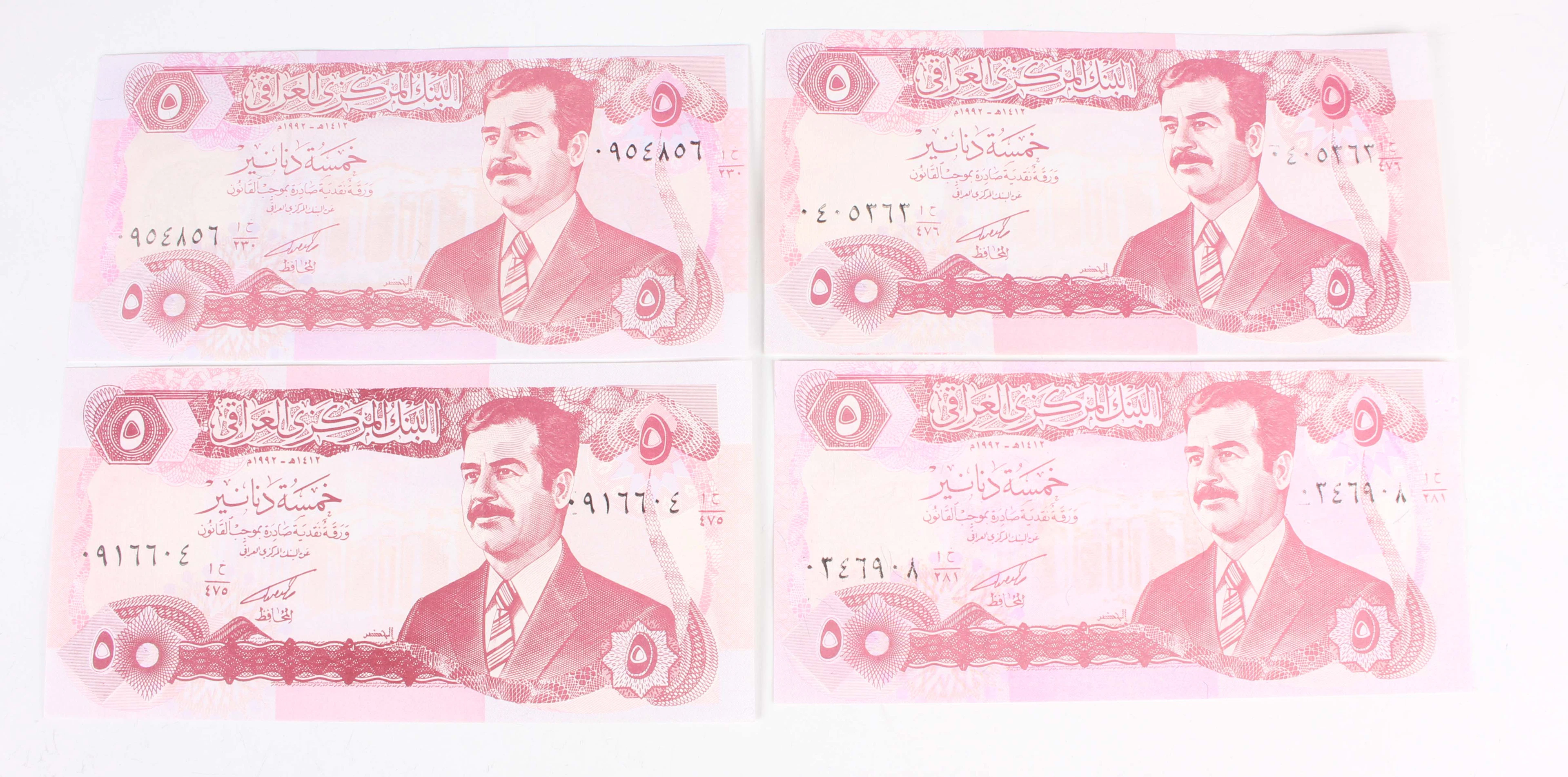 A large collection of Middle Eastern banknotes, including Afghanistan
