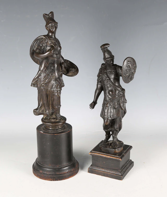 After Tiziano Aspetti - two darkly patinated cast bronze figures wearing
