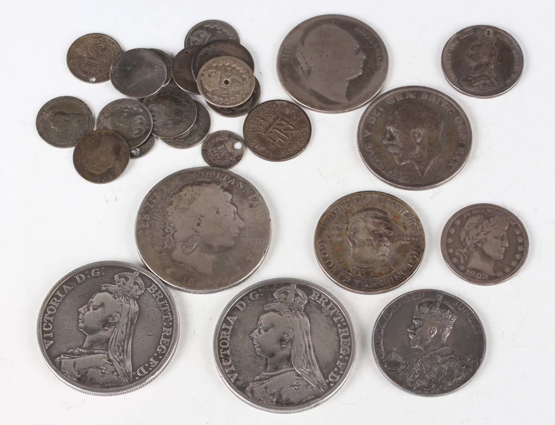 A small collection of 19th and 20th century silver and silver nickel